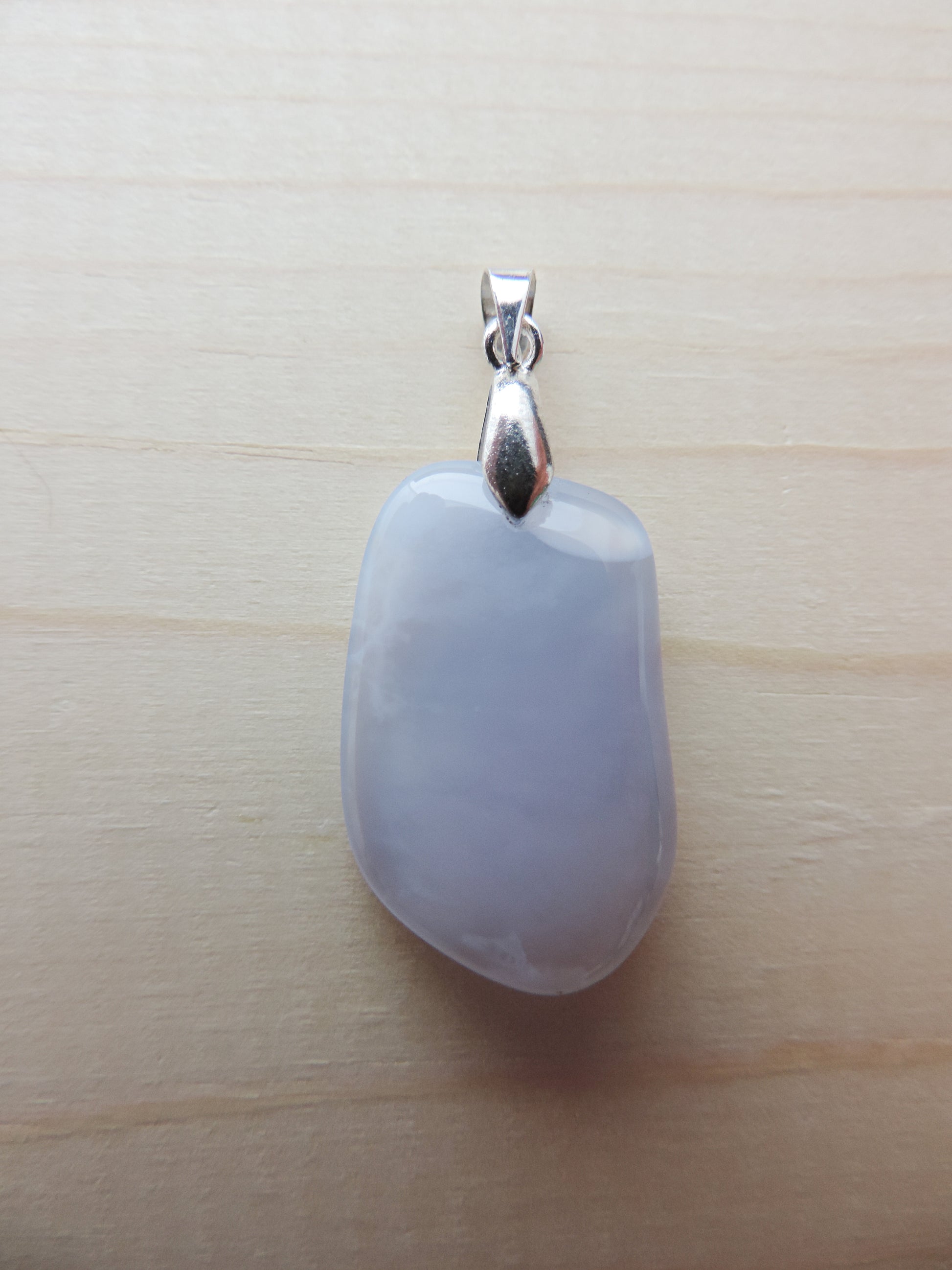 This rare stone is found in only a few locations in Montana, our material is hand collected on private property in the mountains and carried out in backpacks...each piece worth its weight in every step!  The translucent blue agate and its color variations have an alluring effect, many people find the blue agate a relaxing, calming and peaceful stone to wear.  Original and unique in design, each piece is hand crafted by lapidary artists in Montana.