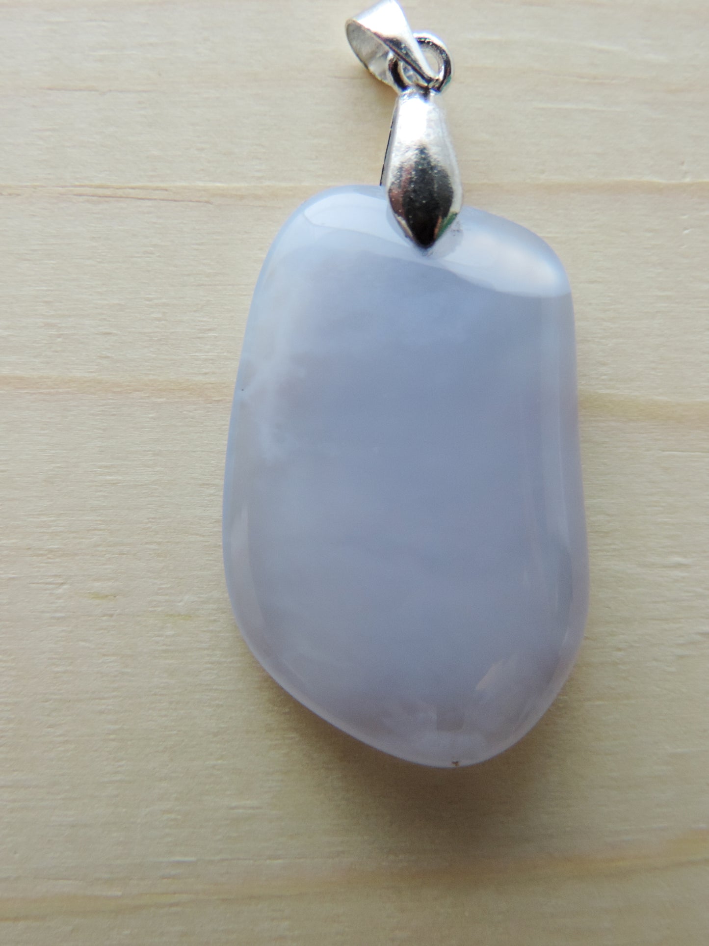 This rare stone is found in only a few locations in Montana, our material is hand collected on private property in the mountains and carried out in backpacks...each piece worth its weight in every step!  The translucent blue agate and its color variations have an alluring effect, many people find the blue agate a relaxing, calming and peaceful stone to wear.  Original and unique in design, each piece is hand crafted by lapidary artists in Montana.