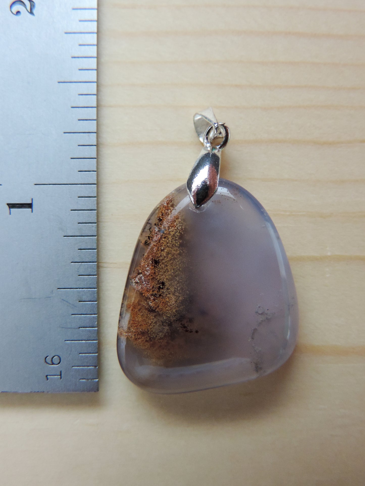 This rare stone is found in only a few locations in Montana, our material is hand collected on private property in the mountains and carried out in backpacks...each piece worth its weight in every step!  The translucent blue agate and its color variations have an alluring effect, many people find the blue agate a relaxing, calming and peaceful stone to wear.  Original and unique in design, each piece is hand crafted by lapidary artists in Montana.