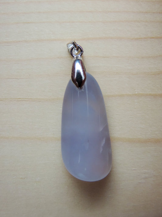 This rare stone is found in only a few locations in Montana, our material is hand collected on private property in the mountains and carried out in backpacks...each piece worth its weight in every step!  The translucent blue agate and its color variations have an alluring effect, many people find the blue agate a relaxing, calming and peaceful stone to wear.  Original and unique in design, each piece is hand crafted by lapidary artists in Montana.