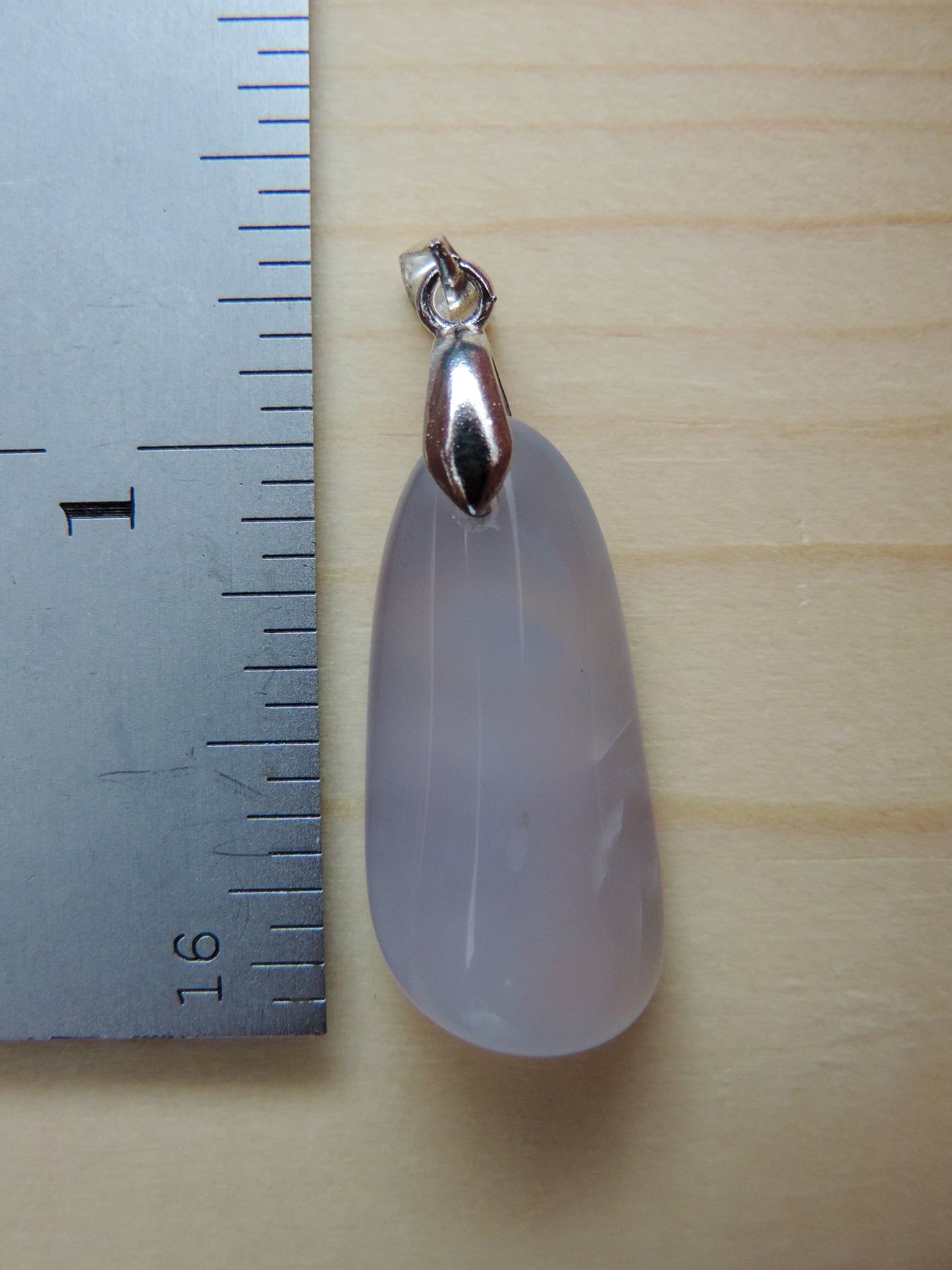 This rare stone is found in only a few locations in Montana, our material is hand collected on private property in the mountains and carried out in backpacks...each piece worth its weight in every step!  The translucent blue agate and its color variations have an alluring effect, many people find the blue agate a relaxing, calming and peaceful stone to wear.  Original and unique in design, each piece is hand crafted by lapidary artists in Montana.