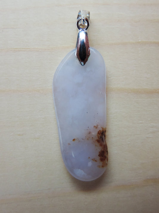 This rare stone is found in only a few locations in Montana, our material is hand collected on private property in the mountains and carried out in backpacks...each piece worth its weight in every step!  The translucent blue agate and its color variations have an alluring effect, many people find the blue agate a relaxing, calming and peaceful stone to wear.  Original and unique in design, each piece is hand crafted by lapidary artists in Montana.