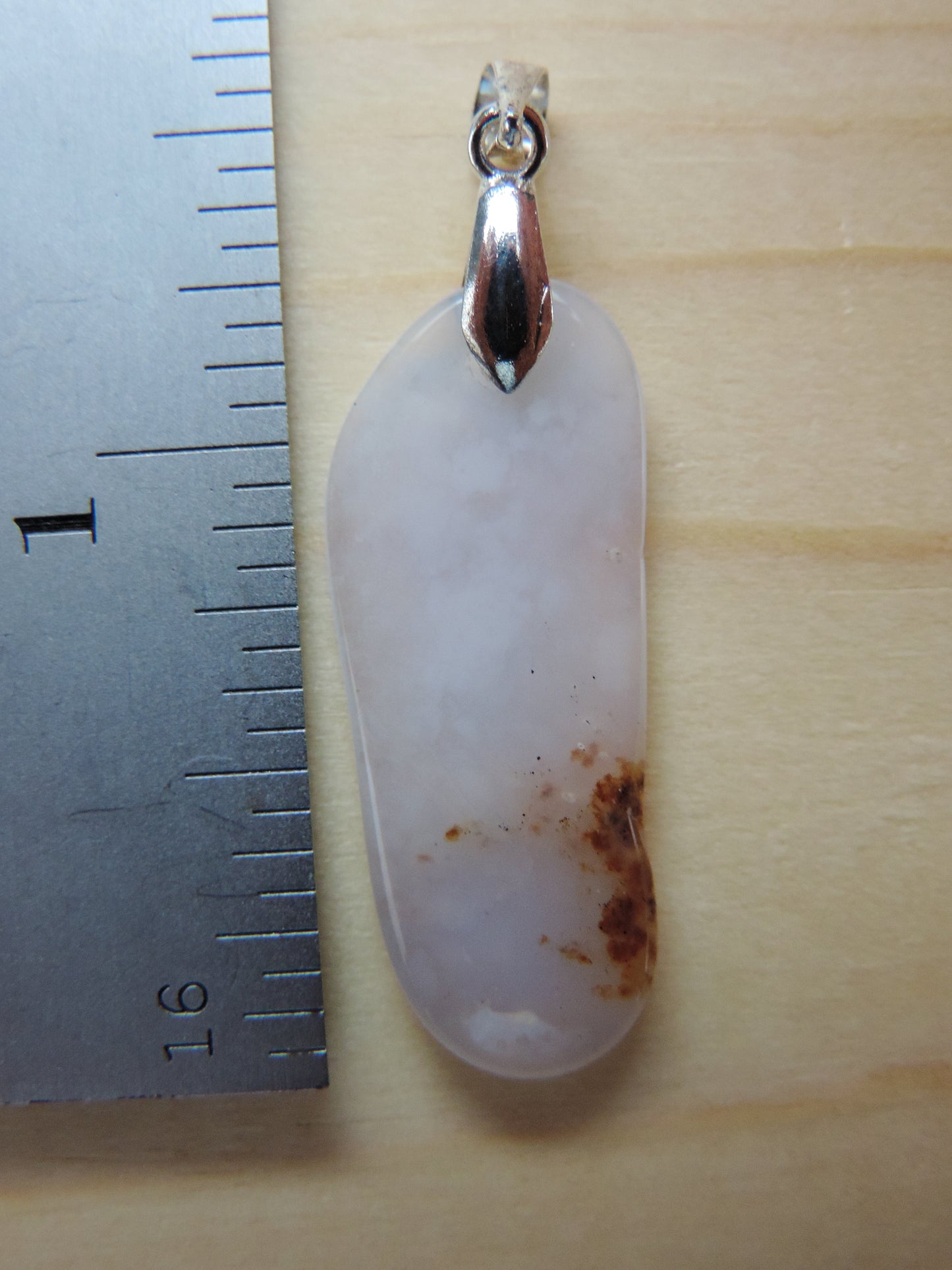 This rare stone is found in only a few locations in Montana, our material is hand collected on private property in the mountains and carried out in backpacks...each piece worth its weight in every step!  The translucent blue agate and its color variations have an alluring effect, many people find the blue agate a relaxing, calming and peaceful stone to wear.  Original and unique in design, each piece is hand crafted by lapidary artists in Montana.