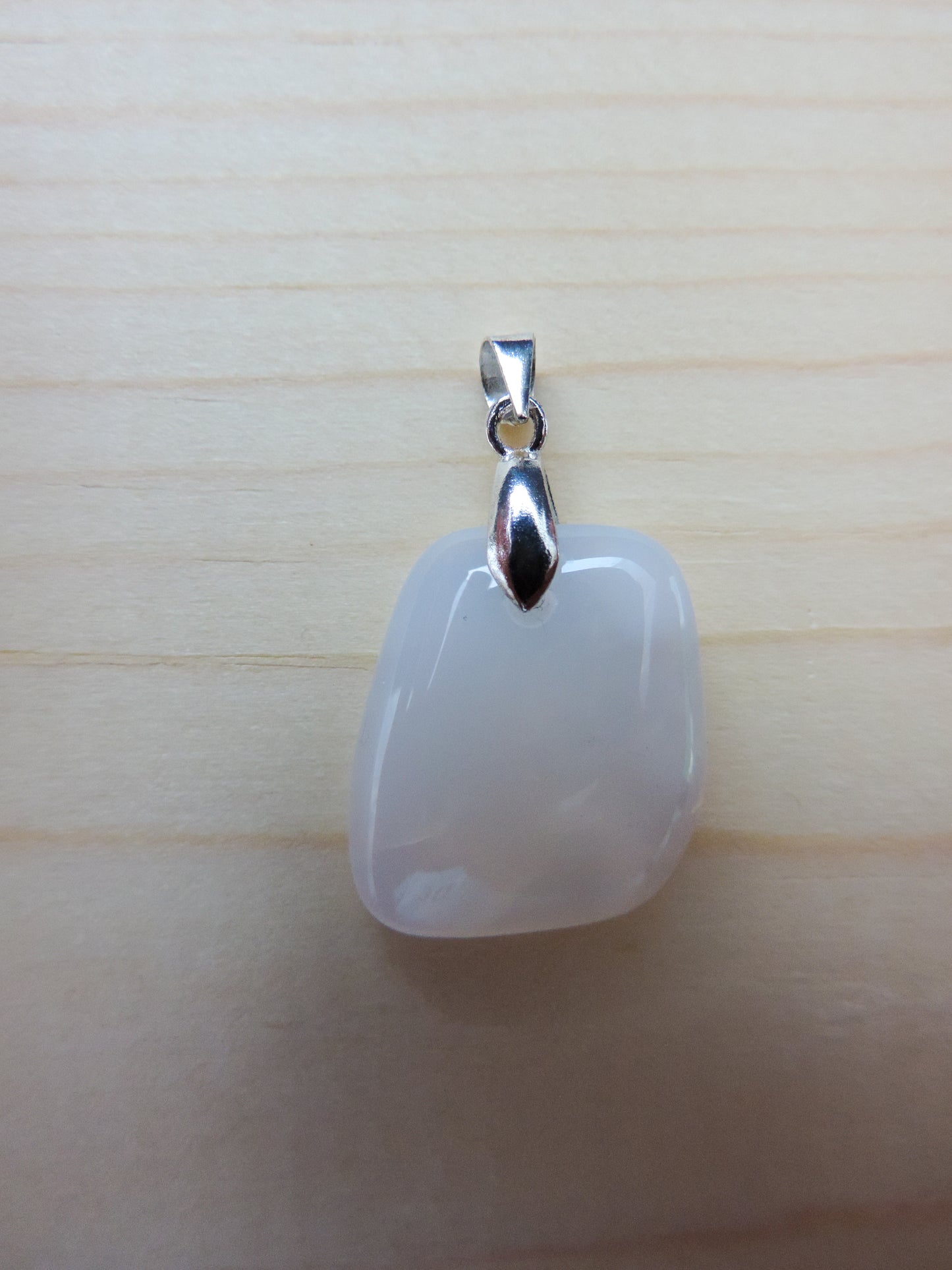 This rare stone is found in only a few locations in Montana, our material is hand collected on private property in the mountains and carried out in backpacks...each piece worth its weight in every step!  The translucent blue agate and its color variations have an alluring effect, many people find the blue agate a relaxing, calming and peaceful stone to wear.  Original and unique in design, each piece is hand crafted by lapidary artists in Montana.