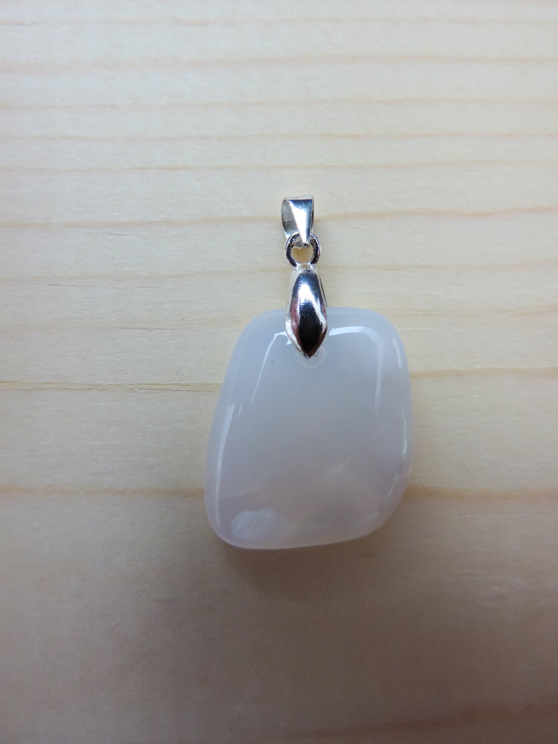 This rare stone is found in only a few locations in Montana, our material is hand collected on private property in the mountains and carried out in backpacks...each piece worth its weight in every step!  The translucent blue agate and its color variations have an alluring effect, many people find the blue agate a relaxing, calming and peaceful stone to wear.  Original and unique in design, each piece is hand crafted by lapidary artists in Montana.