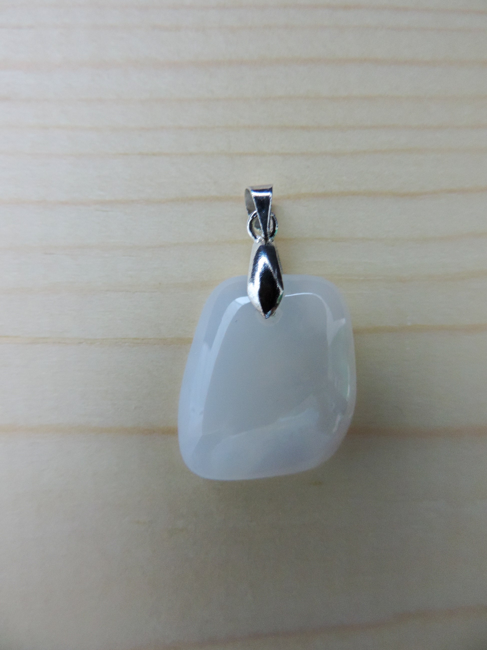 This rare stone is found in only a few locations in Montana, our material is hand collected on private property in the mountains and carried out in backpacks...each piece worth its weight in every step!  The translucent blue agate and its color variations have an alluring effect, many people find the blue agate a relaxing, calming and peaceful stone to wear.  Original and unique in design, each piece is hand crafted by lapidary artists in Montana.