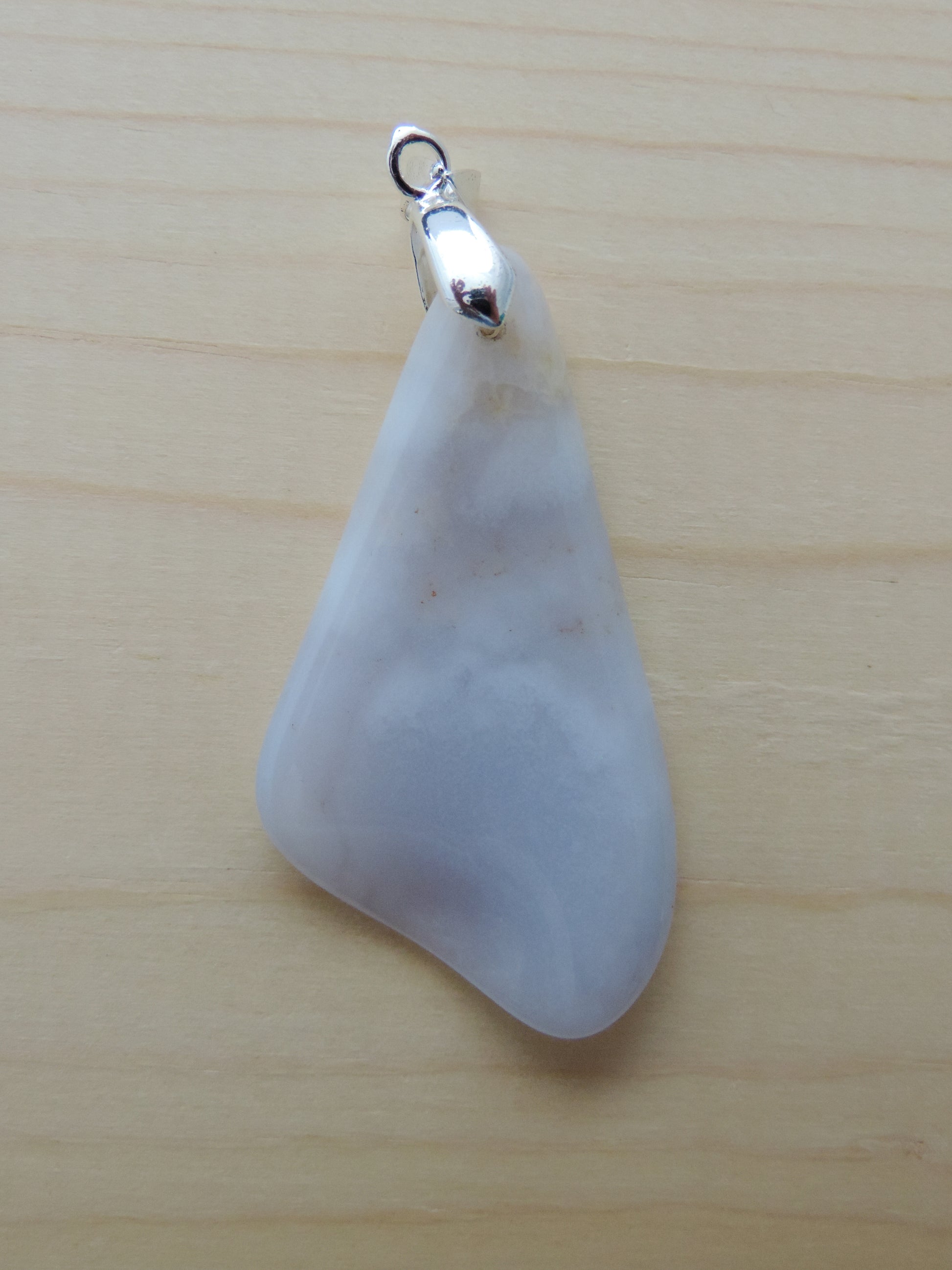 This rare stone is found in only a few locations in Montana, our material is hand collected on private property in the mountains and carried out in backpacks...each piece worth its weight in every step!  The translucent blue agate and its color variations have an alluring effect, many people find the blue agate a relaxing, calming and peaceful stone to wear.  Original and unique in design, each piece is hand crafted by lapidary artists in Montana.