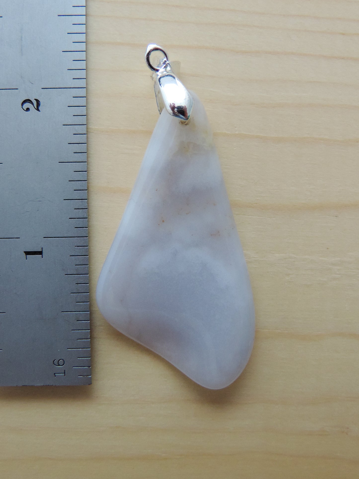 This rare stone is found in only a few locations in Montana, our material is hand collected on private property in the mountains and carried out in backpacks...each piece worth its weight in every step!  The translucent blue agate and its color variations have an alluring effect, many people find the blue agate a relaxing, calming and peaceful stone to wear.  Original and unique in design, each piece is hand crafted by lapidary artists in Montana.