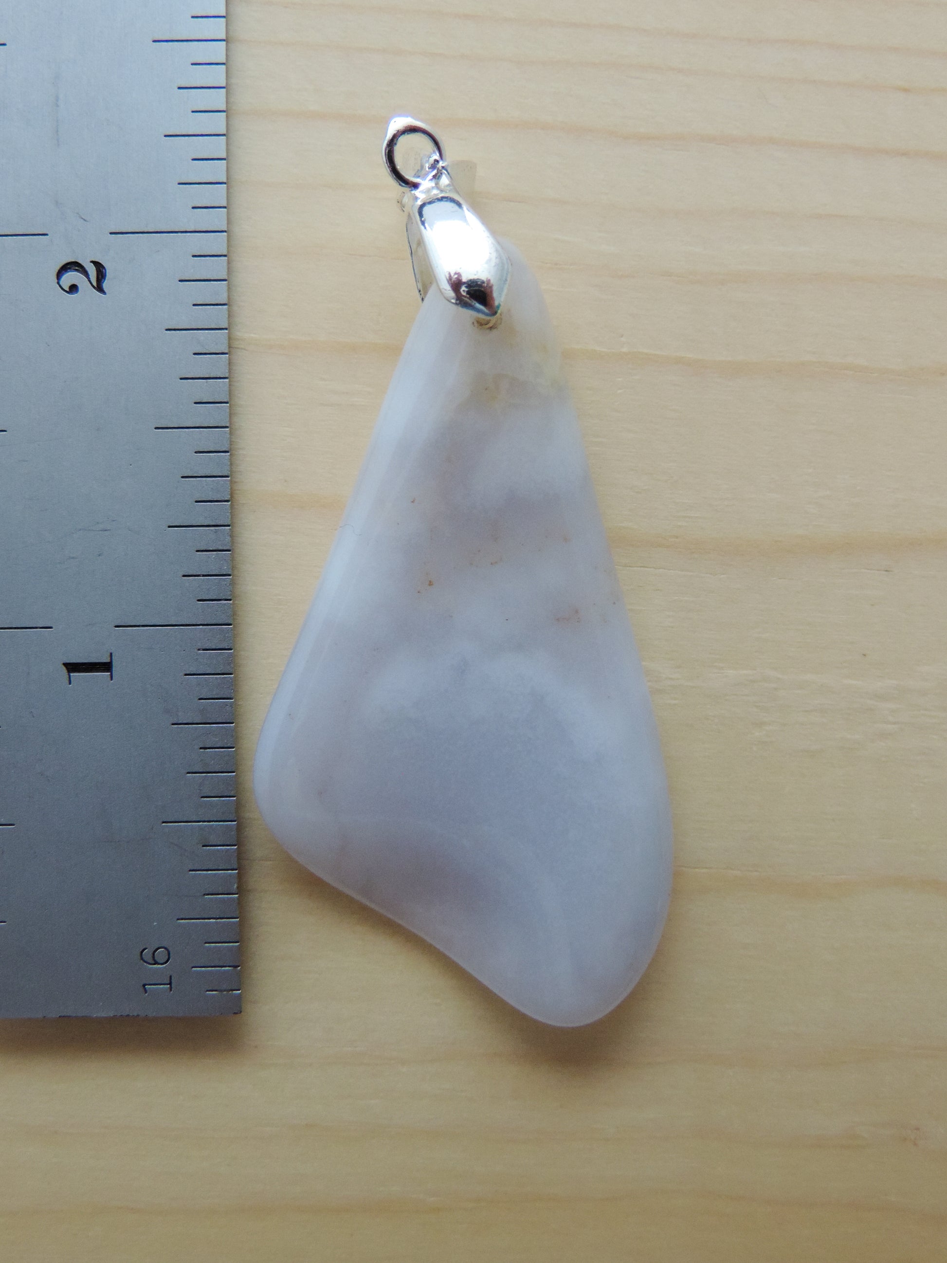 This rare stone is found in only a few locations in Montana, our material is hand collected on private property in the mountains and carried out in backpacks...each piece worth its weight in every step!  The translucent blue agate and its color variations have an alluring effect, many people find the blue agate a relaxing, calming and peaceful stone to wear.  Original and unique in design, each piece is hand crafted by lapidary artists in Montana.