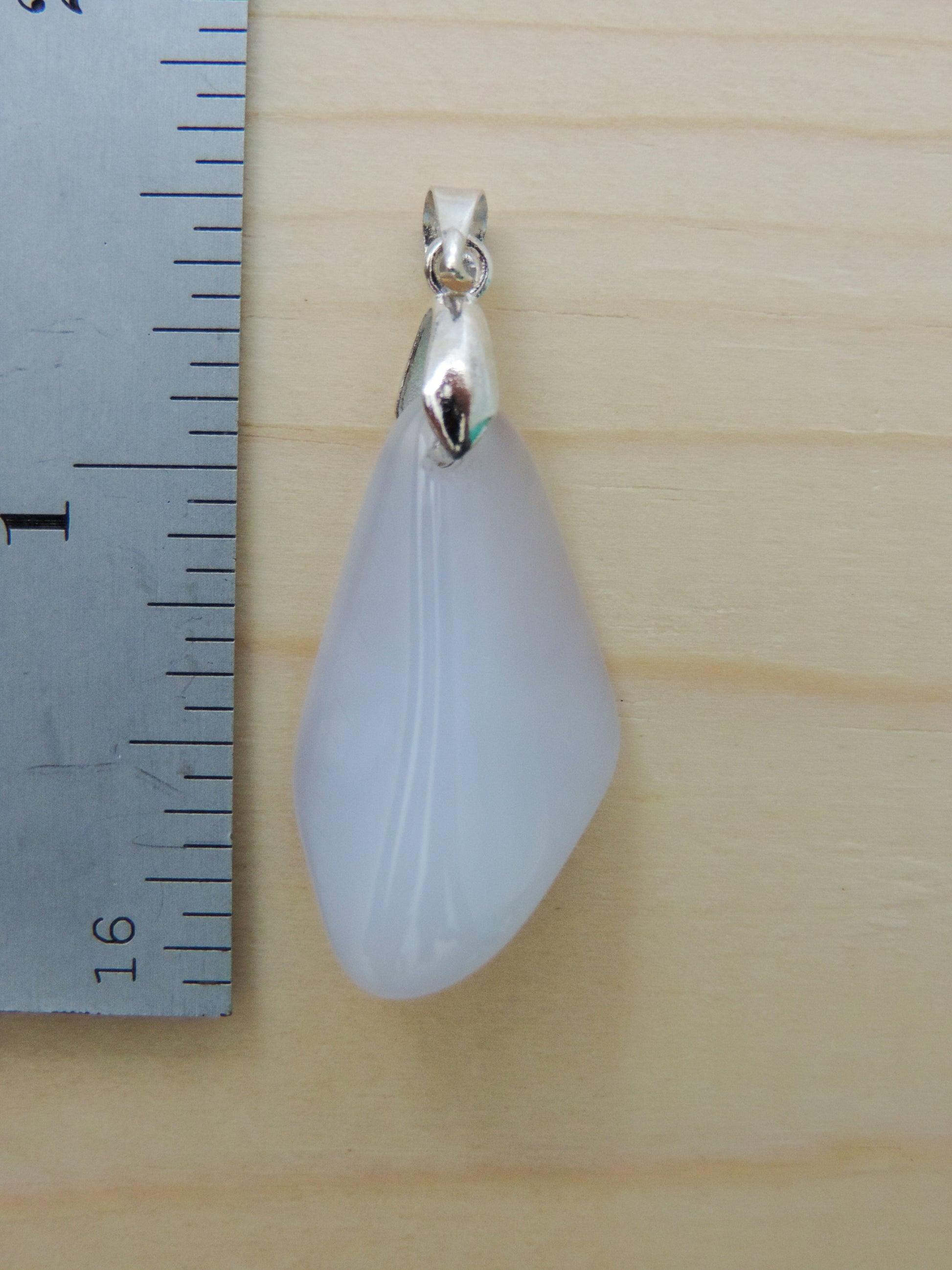 This rare stone is found in only a few locations in Montana, our material is hand collected on private property in the mountains and carried out in backpacks...each piece worth its weight in every step!  The translucent blue agate and its color variations have an alluring effect, many people find the blue agate a relaxing, calming and peaceful stone to wear.  Original and unique in design, each piece is hand crafted by lapidary artists in Montana.