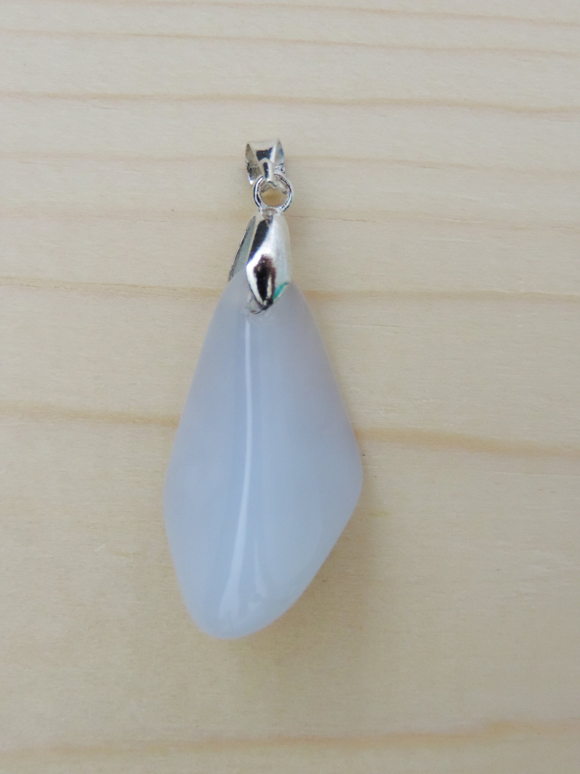 This rare stone is found in only a few locations in Montana, our material is hand collected on private property in the mountains and carried out in backpacks...each piece worth its weight in every step!  The translucent blue agate and its color variations have an alluring effect, many people find the blue agate a relaxing, calming and peaceful stone to wear.  Original and unique in design, each piece is hand crafted by lapidary artists in Montana.