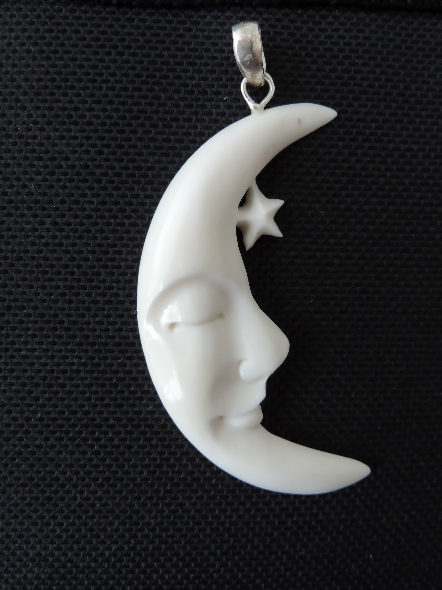Bone Moon Pendant. Hand carved from bone by lapidary artists in Indonesia. Express your cosmic love when you wear this pendant.