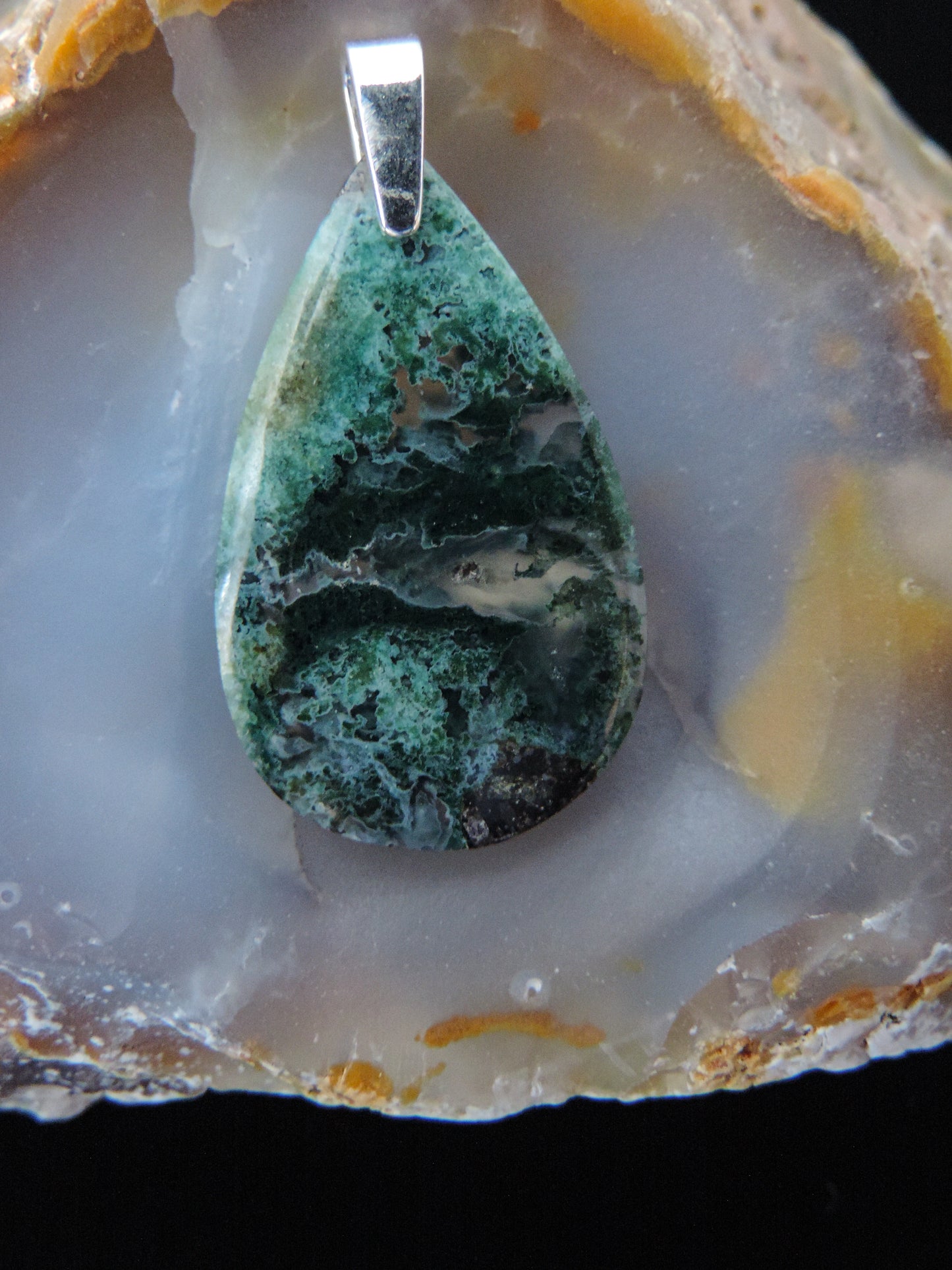 Green Moss Agate from West Java. Indonesian Agates exhibit a wide variety of colors and amazing complexity. No two agates are exactly alike, each one being a unique and beautiful creation! Agates with multiple bands of color are known as fortification agates, those with dendritic or moss looking inclusions are referred to as moss agate