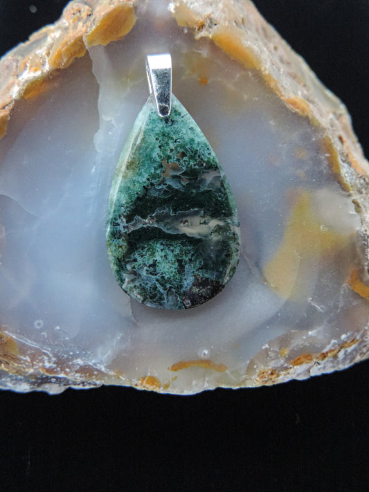 Green Moss Agate from West Java.  Indonesian Agates exhibit a wide variety of colors and amazing complexity.  No two agates are exactly alike, each one being a unique and beautiful creation!  Agates with multiple bands of color are known as fortification agates, those with dendritic or moss looking inclusions are referred to as moss agate