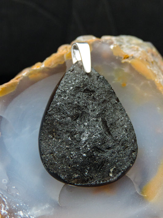 Often referred to as “Pearl of Divine Fire”, Agni Manitite is a rare stone found in the Indonesian archipelago, the pieces on our store come from Belitung, Batam Island.  What makes this stone so rare is that most of the pieces are found in the water, making it incredibly hard to come by.