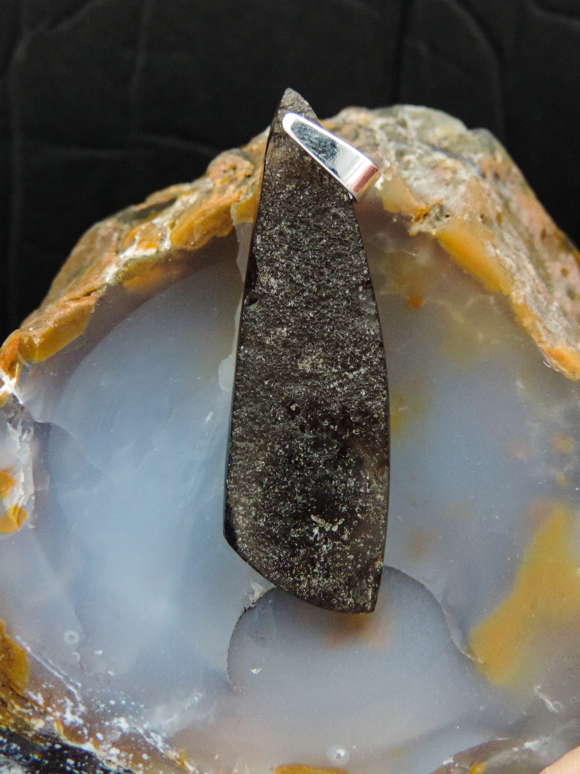 Our hand crafted jewelry pendant is photographed next to a ruler for size.  This stone is a natural color, no dyes or heat treatment have been used.