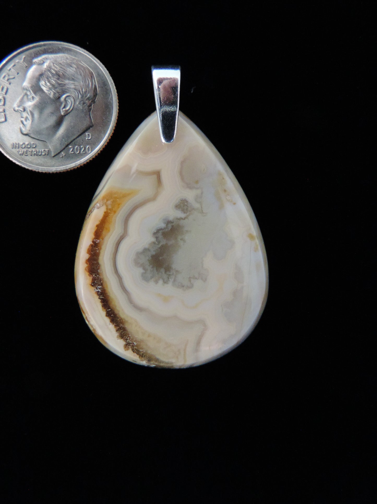 Find your perfect Indonesian Agate Pendant on our store! The pendant bail is authentic 925 sterling silver.