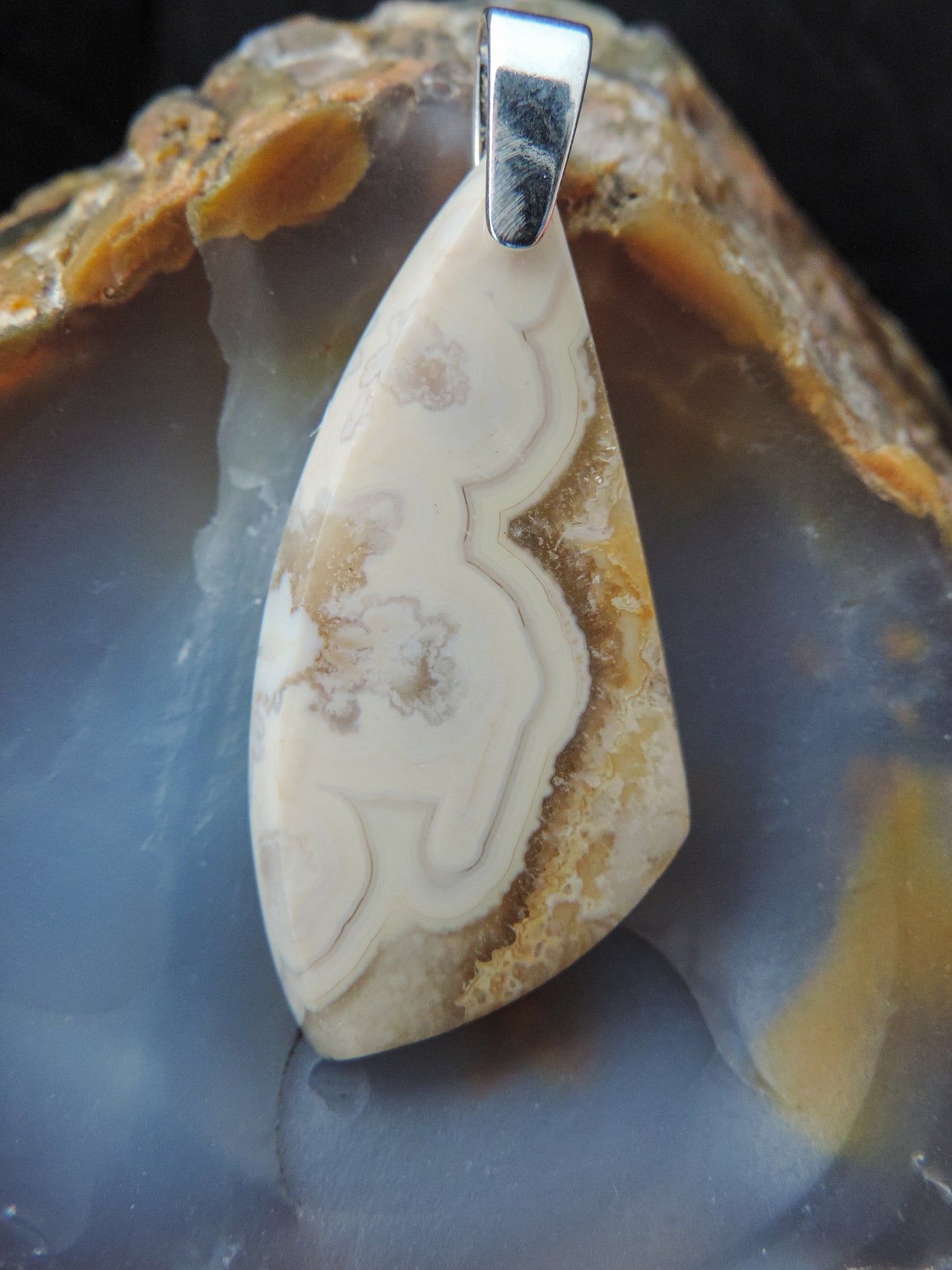 Our hand crafted jewelry is photographed next to a ruler for size. This stone is a natural color, no dyes or heat treatment have been used. It was photographed without filters on automatic setting in natural light; however, slight color variations may occur due to digitization. Natural stones can have nooks and crannies, inclusions or small cracks, these distinguishing features lend character to the piece.