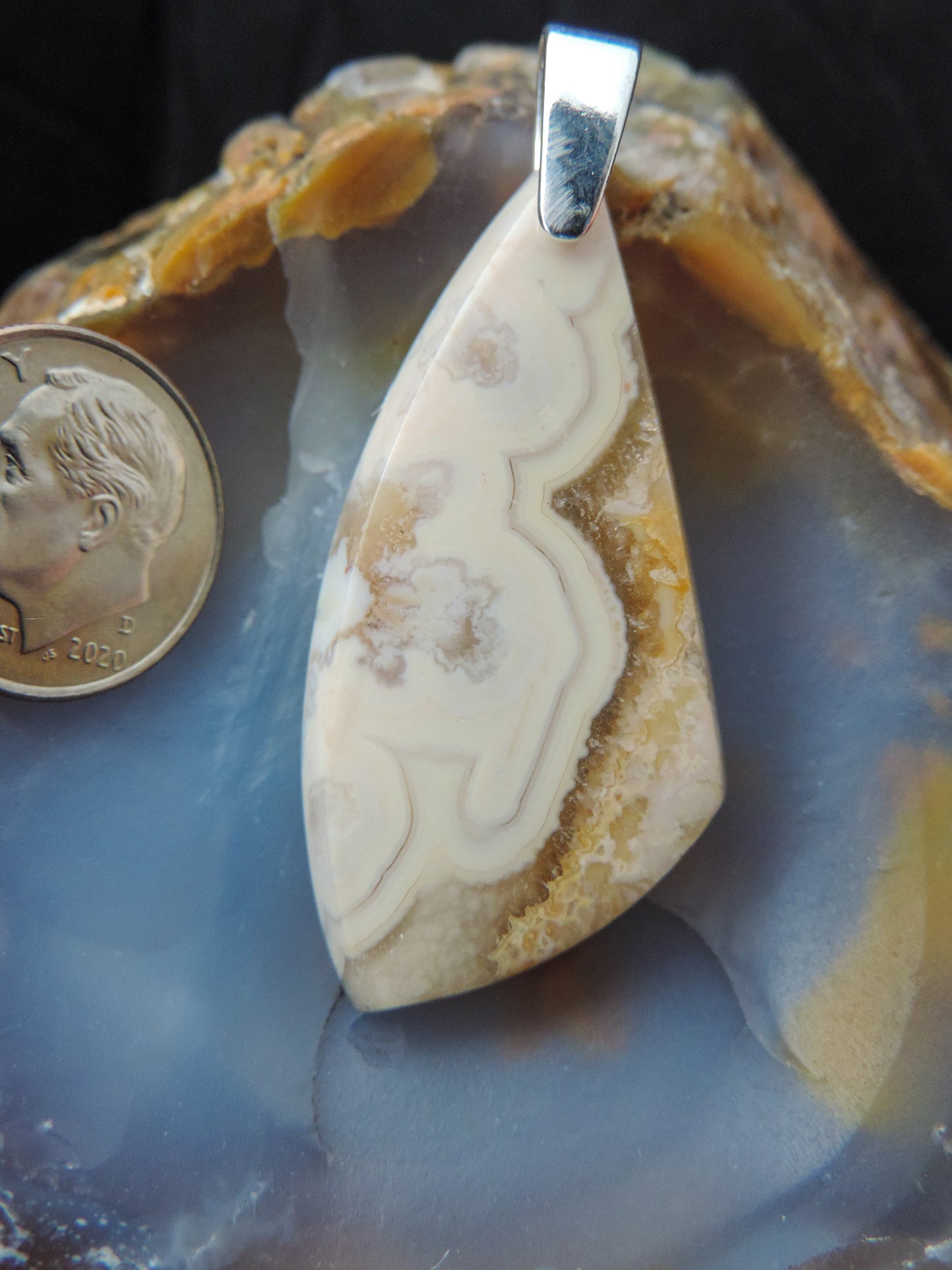 Find your perfect Indonesian Agate on our store! The pendant bail is authentic 925 sterling silver.
