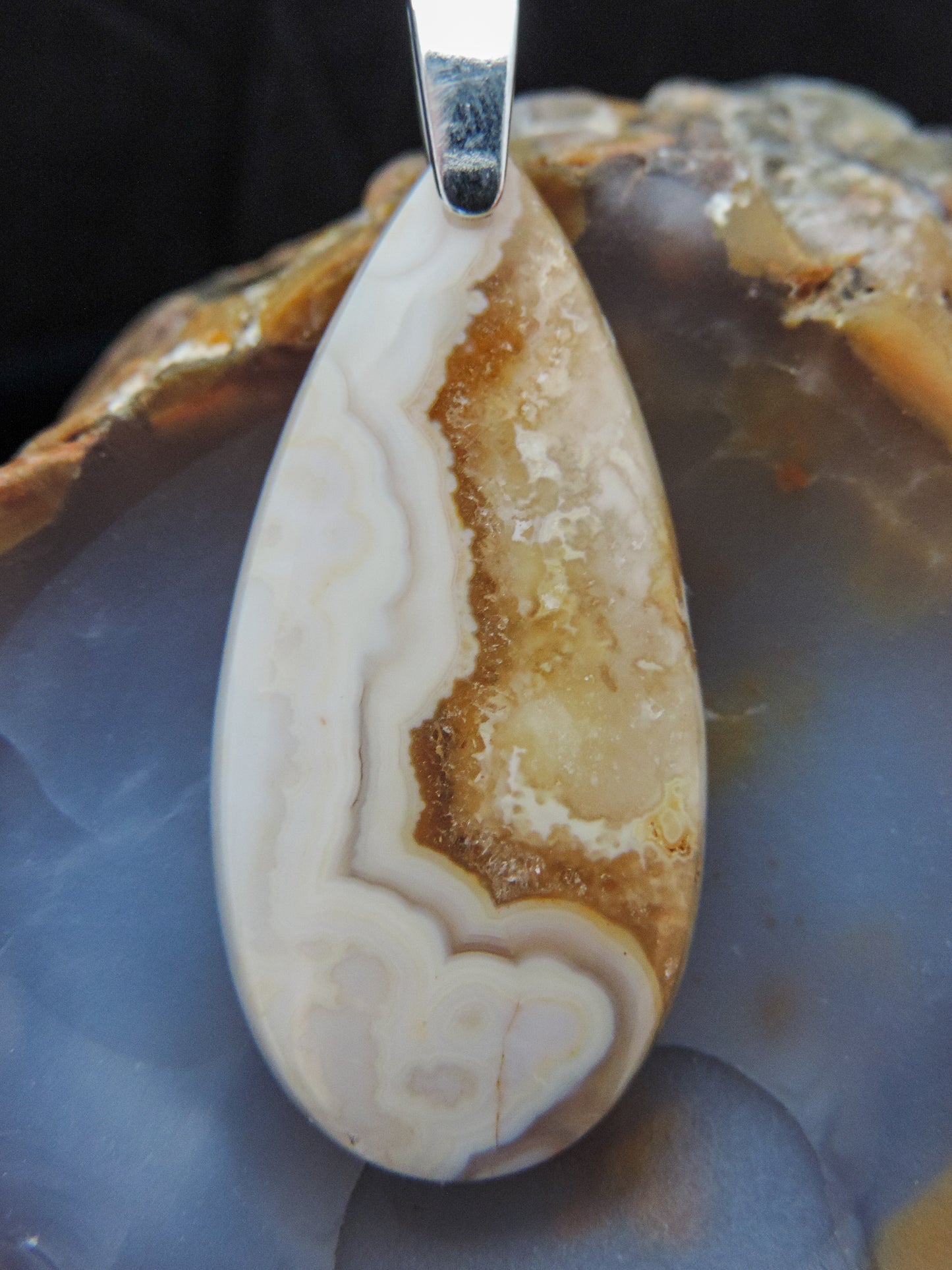 Find your perfect Indonesian Brown Lace Agate & Sterling Silver Pendant on our store! The pendant bail is authentic 925 sterling silver.