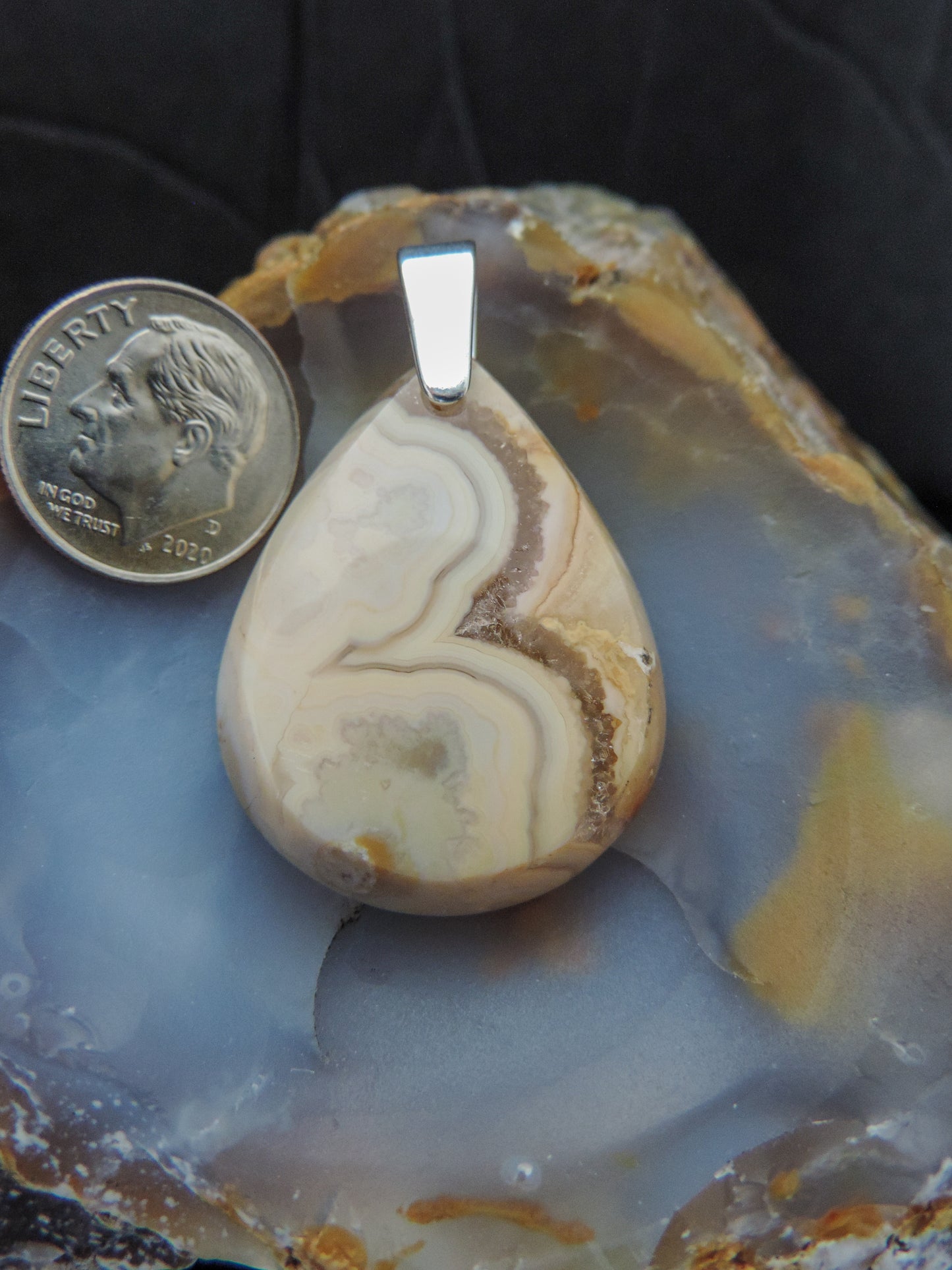 Find your perfect Indonesian Agate on our store! The pendant bail is authentic 925 sterling silver.