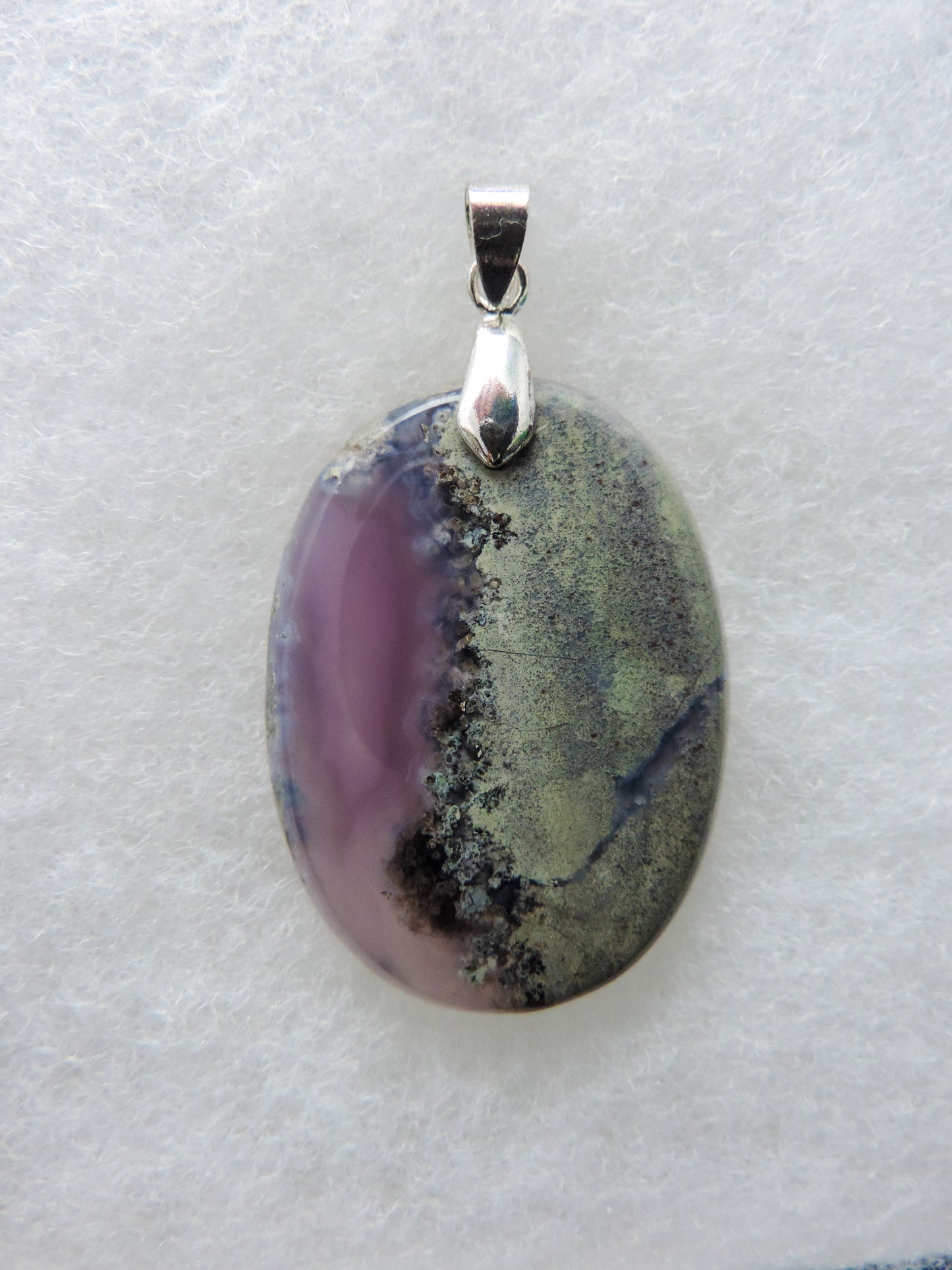 Our hand crafted jewelry is photographed next to a ruler for size. This stone is a natural color, no dyes or heat treatment have been used. Purple gemstones hold significant and powerful spiritual qualities. Purple has been associated with wealth, passion, ambition, magic, awareness, mystery, tranquility, inspiration, understanding, calmness and wisdom to name a few. Purple Moss Agate from Java, Indonesia