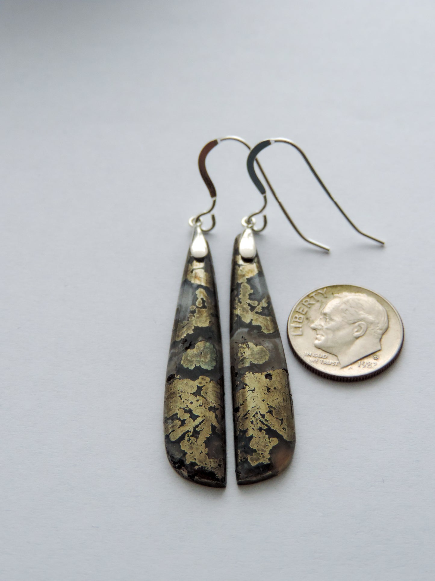 Choose your favorite marcasite earrings and adorn yourself like a queen The bail and earring wire are authentic 925 sterling silver. Our hand crafted jewelry earrings are photographed next to a ruler for size. This stone is a natural color, no dyes or heat treatment have been used.