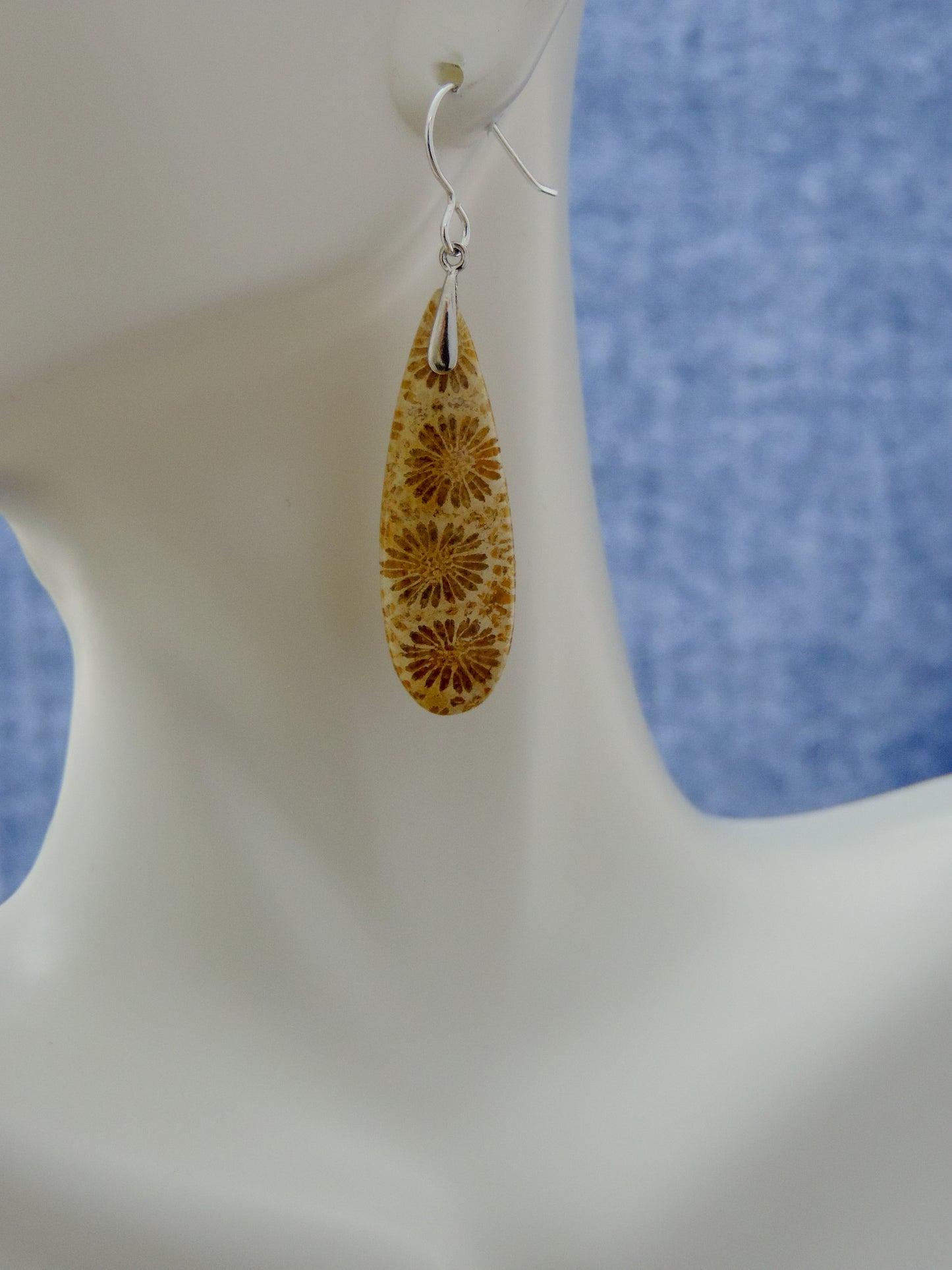 Our hand crafted jewelry earrings are photographed next to a ruler for size. This stone is a natural color, no dyes or heat treatment have been used.