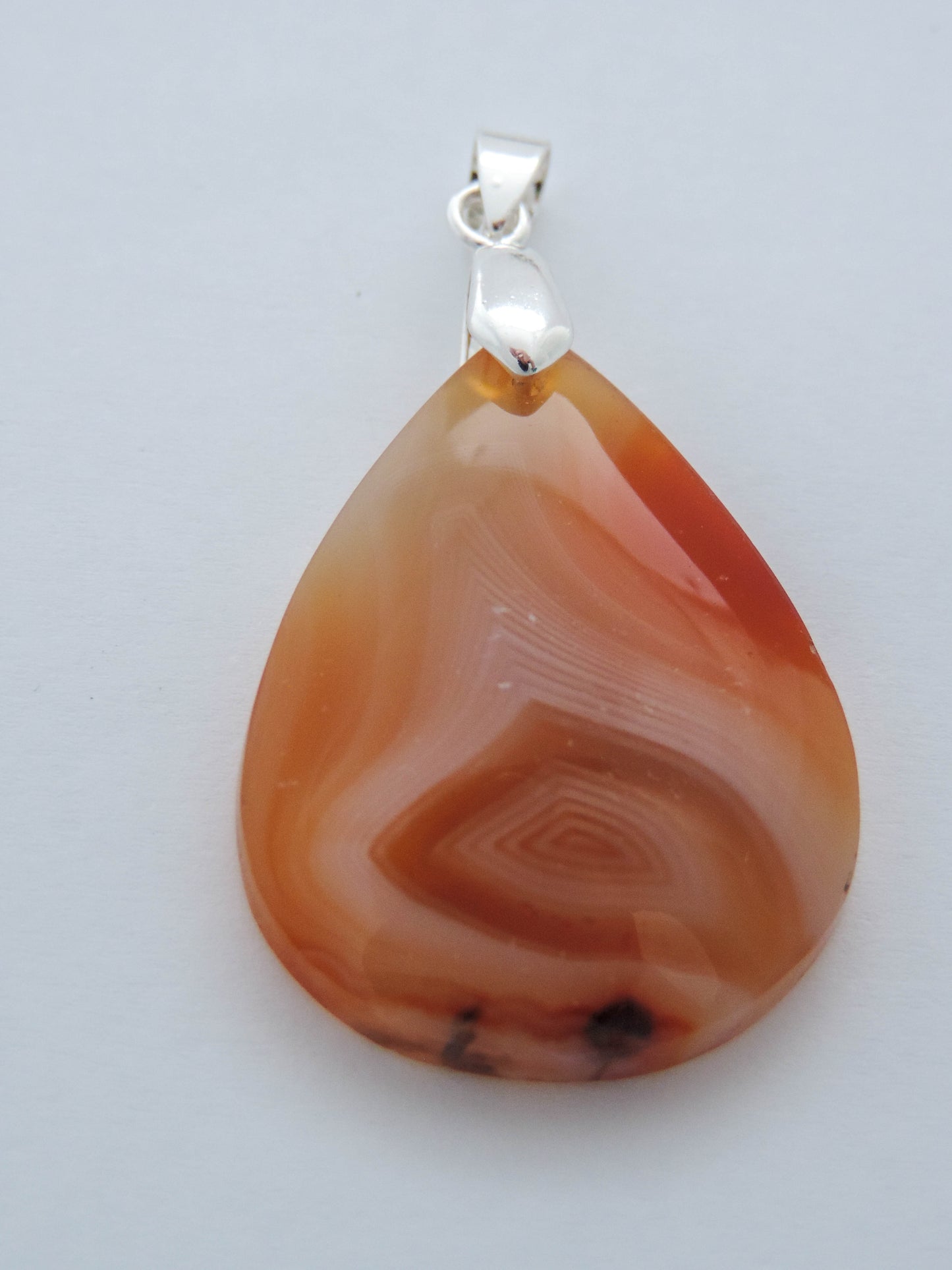 Timor Agate & Sterling Silver Pendant.  Timor Agate from Sumatra.  Indonesian Agates exhibit a wide variety of colors and amazing complexity.  No two agates are exactly alike, each one being a unique and beautiful creation!