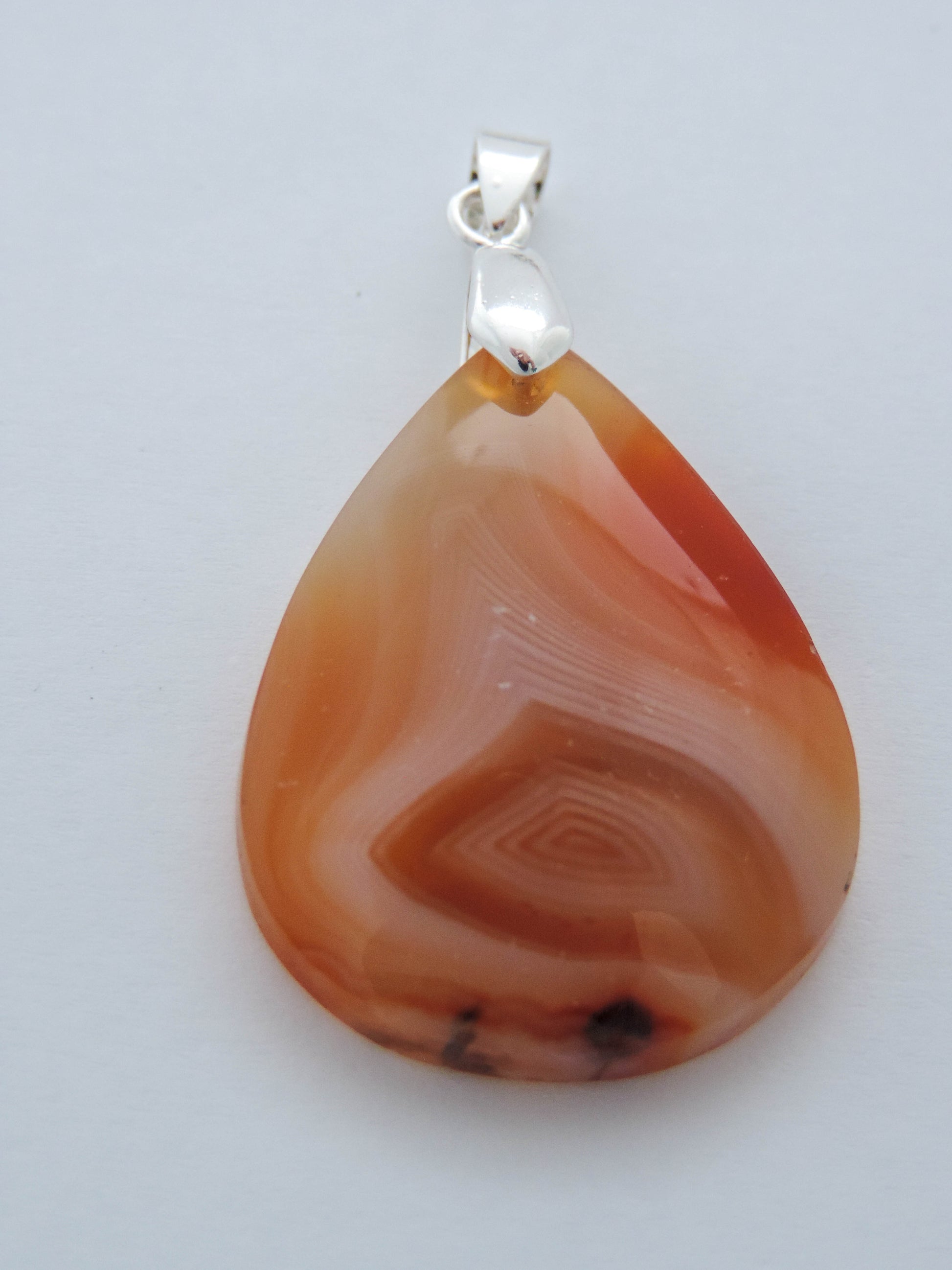 Timor Agate & Sterling Silver Pendant.  Timor Agate from Sumatra.  Indonesian Agates exhibit a wide variety of colors and amazing complexity.  No two agates are exactly alike, each one being a unique and beautiful creation!