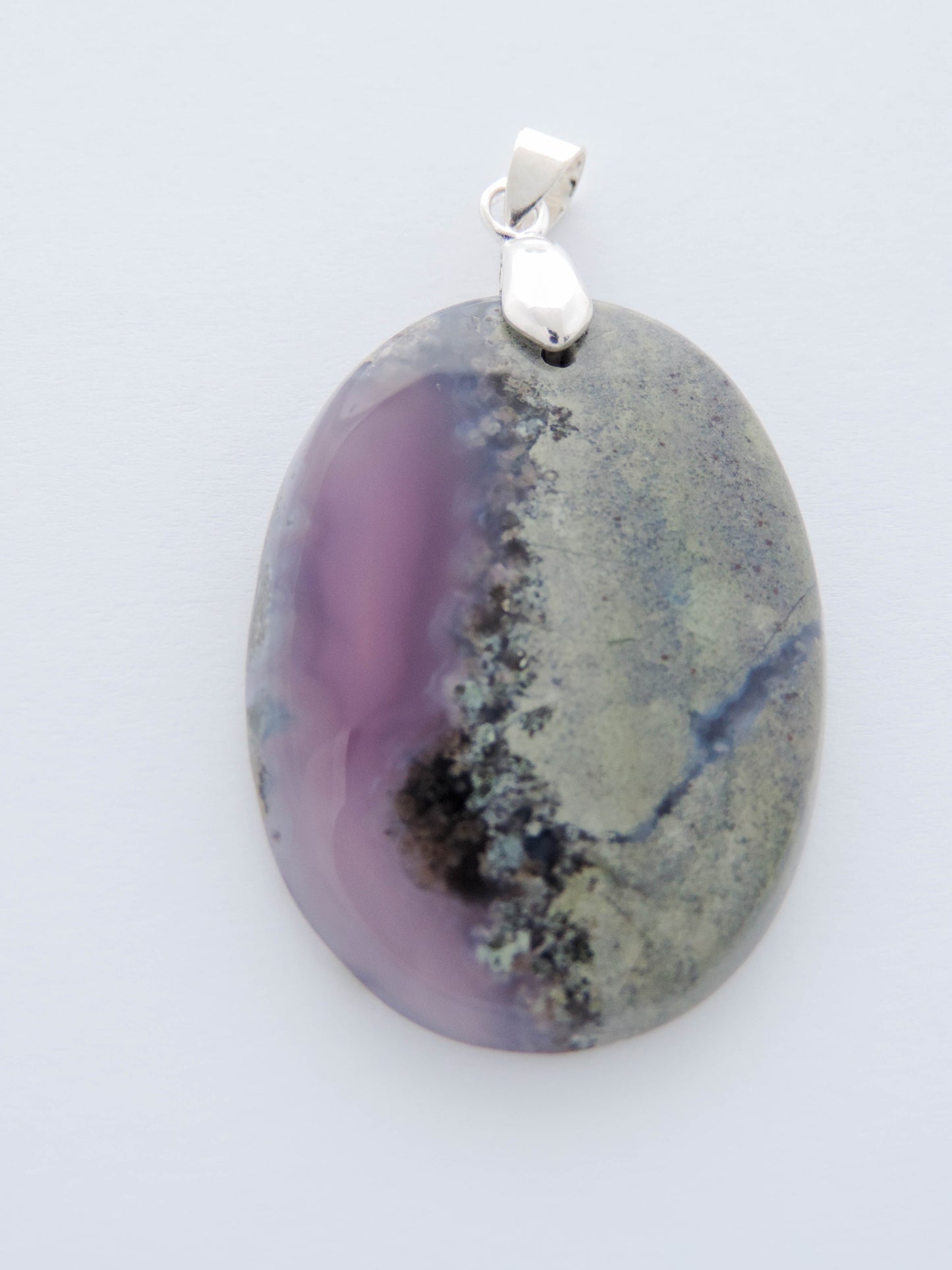 Our hand crafted jewelry is photographed next to a ruler for size. This stone is a natural color, no dyes or heat treatment have been used. Purple gemstones hold significant and powerful spiritual qualities. Purple has been associated with wealth, passion, ambition, magic, awareness, mystery, tranquility, inspiration, understanding, calmness and wisdom to name a few.