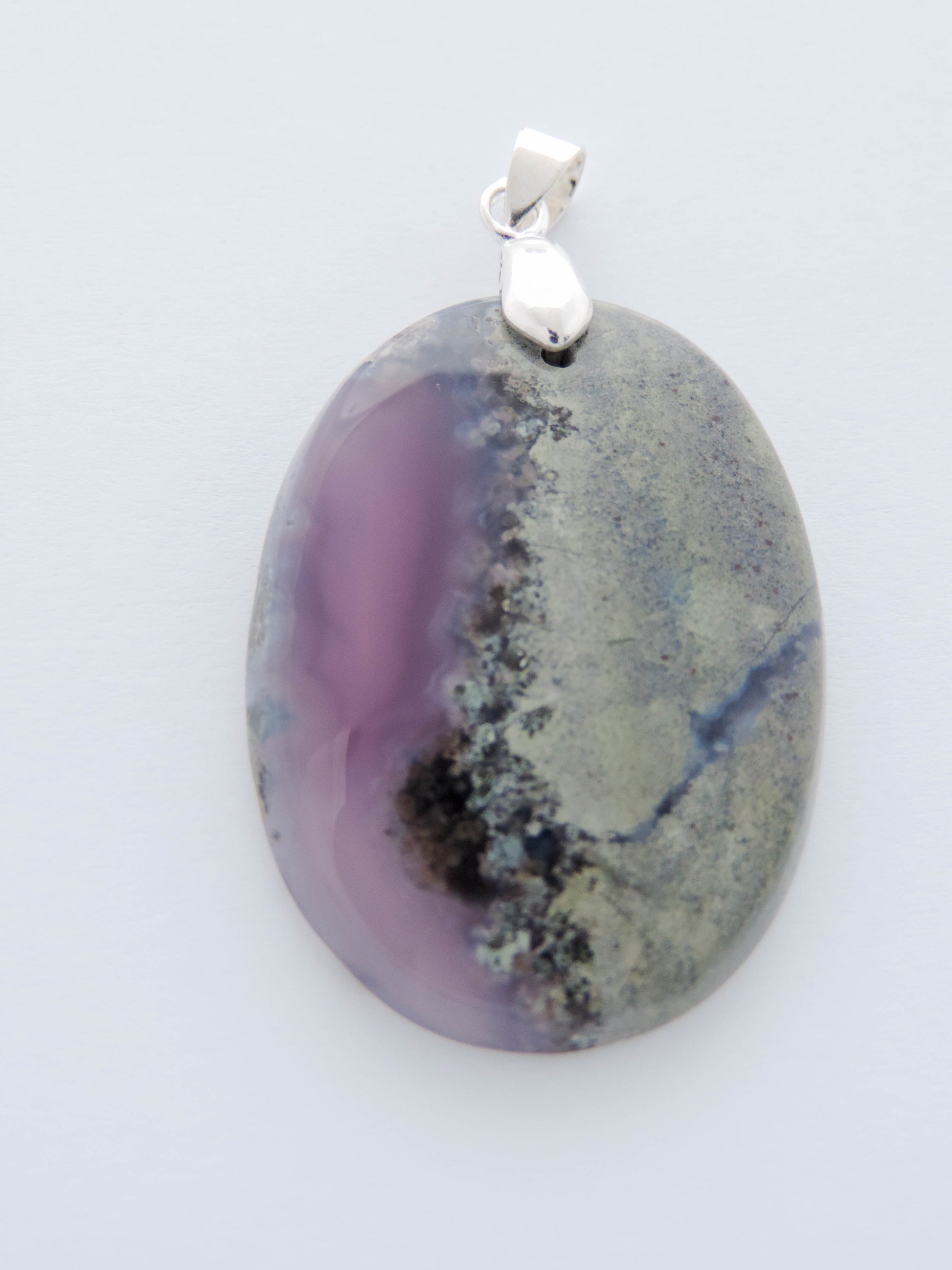 Our hand crafted jewelry is photographed next to a ruler for size.  This stone is a natural color, no dyes or heat treatment have been used. Purple gemstones hold significant and powerful spiritual qualities.  Purple has been associated with wealth, passion, ambition, magic, awareness, mystery, tranquility, inspiration, understanding, calmness and wisdom to name a few.