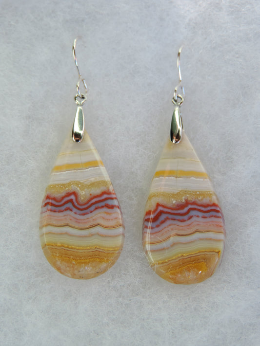 Lace Agate & Sterling Silver Earrings.  Indonesian Lace Agate Earrings exhibit a wide variety of colors and amazing complexity.  No two agates are exactly alike, each one being a unique and beautiful creation!  Agates with multiple bands of color are known as fortification agates, those with dendritic or moss looking inclusions are referred to as moss agate and many others are given descriptive names relative to their appearance or where they are found.