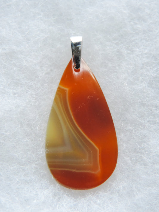 Timor Agate & Sterling Silver Pendant.  Timor Agate from Sumatra.  Indonesian Agates exhibit a wide variety of colors and amazing complexity.  No two agates are exactly alike, each one being a unique and beautiful creation!  Agates with multiple bands of color are known as fortification agates, those with dendritic or moss looking inclusions are referred to as moss agate and many others are given descriptive names relative to their appearance or where they are found.