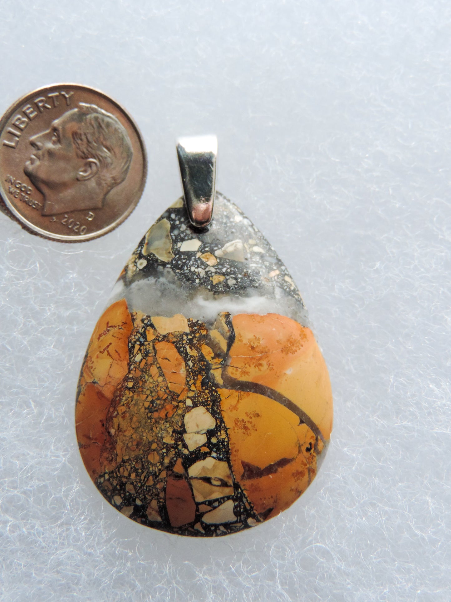 Maligano Jasper & Sterling Silver Pendant. Maligano Jasper is a specific type of jasper found in Indonesia and forms in ancient volcanic hot springs areas. It’s named after a small village in Sulawesi, Indonesia and is mined by hand as the village doesn’t have the heavy machinery required for deep excavation mining techniques. Found roughly ten years ago, this stone has made its way into the main stream market.