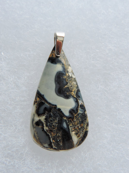Maligano Jasper & Sterling Silver Pendant.  Maligano Jasper is a specific type of jasper found in Indonesia and forms in ancient volcanic hot springs areas.  It’s named after a small village in Sulawesi, Indonesia and is mined by hand as the village doesn’t have the heavy machinery required for deep excavation mining techniques.