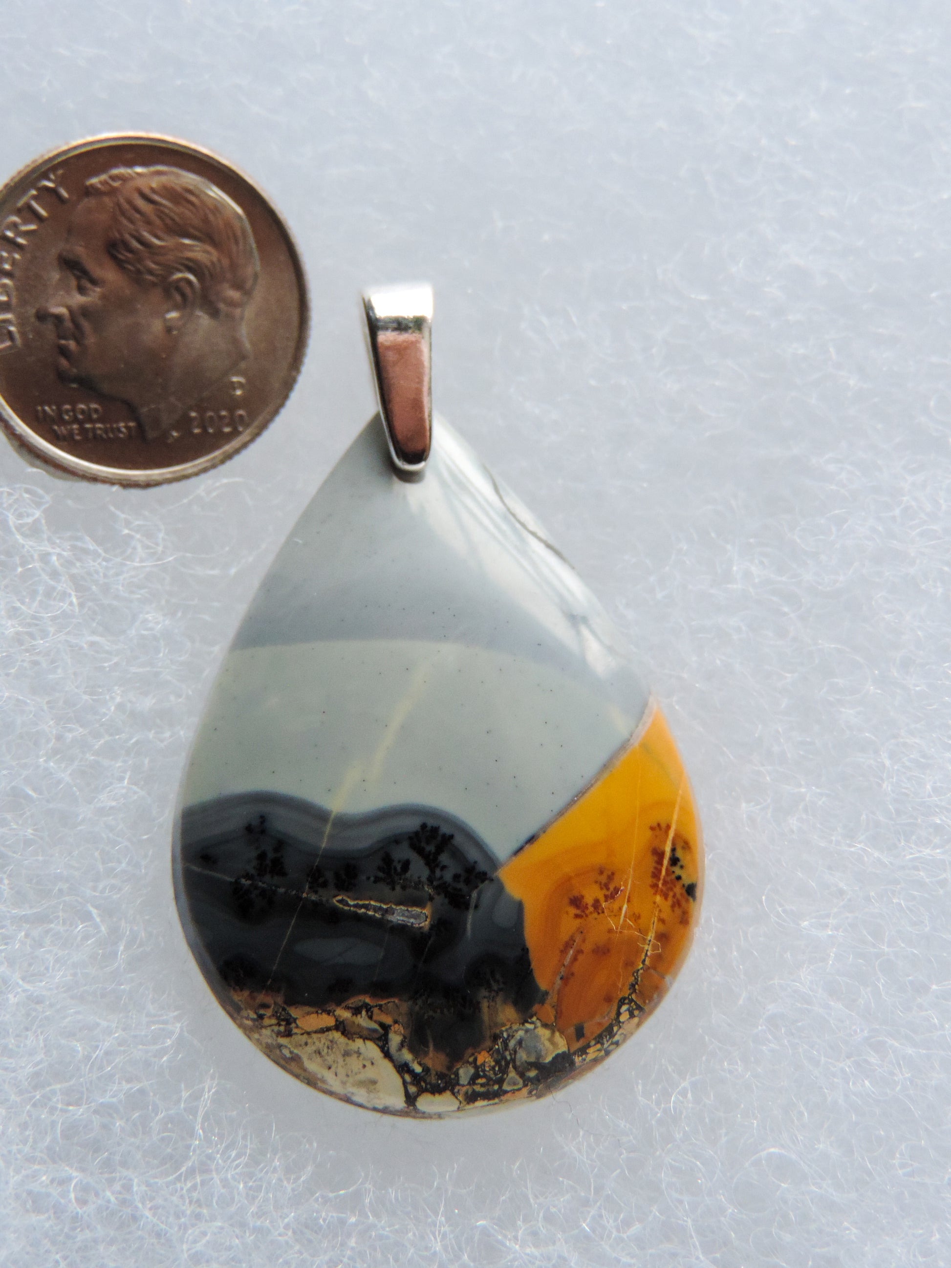 Maligano Jasper & Sterling Silver Pendant.  Maligano Jasper is a specific type of jasper found in Indonesia and forms in ancient volcanic hot springs areas.  It’s named after a small village in Sulawesi, Indonesia and is mined by hand as the village doesn’t have the heavy machinery required for deep excavation mining techniques.