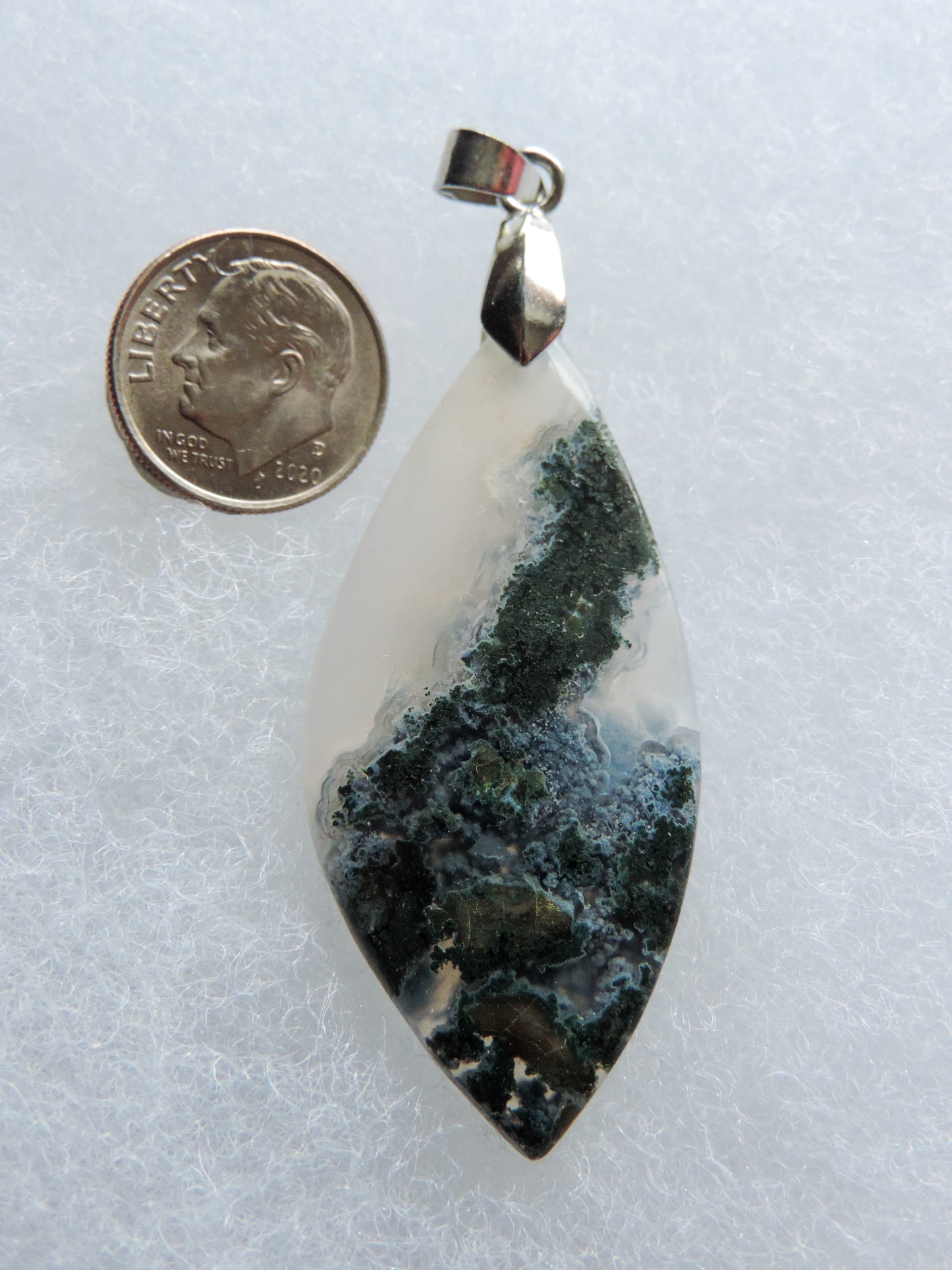 Find your perfect Indonesian Agate on our store! The pendant bail is authentic 925 sterling silver.