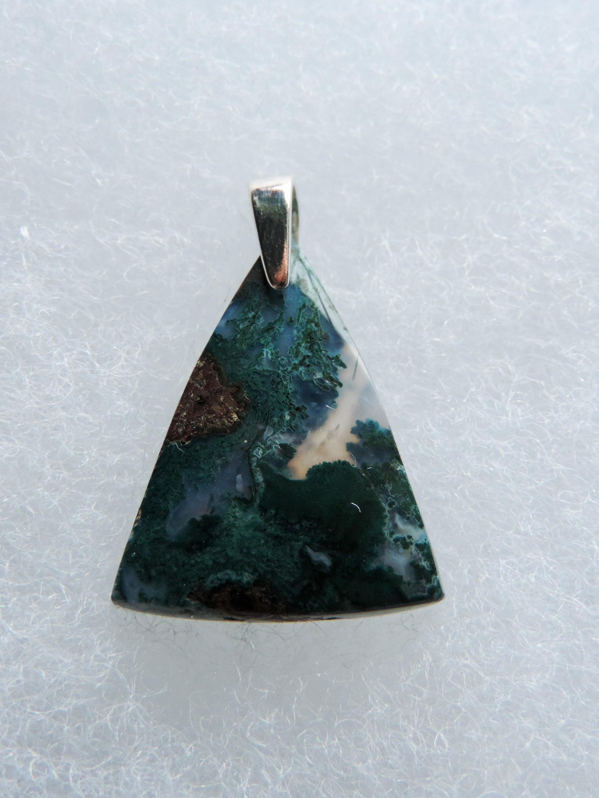 Green Moss Agate & Sterling Silver Pendant.  Green Moss Agate from West Java.  Indonesian Agates exhibit a wide variety of colors and amazing complexity.  No two agates are exactly alike, each one being a unique and beautiful creation!