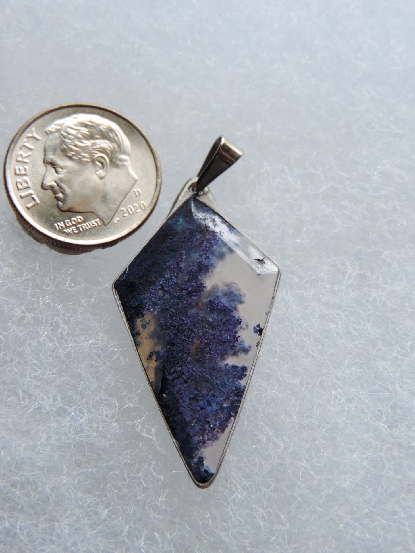 Find your perfect Indonesian Moss Agate Pendant on our store! Our hand crafted jewelry pendant is photographed next to an item for size comparison. They are photographed without filters on automatic setting in natural light; however, slight color variations may occur due to digitization. Natural stones can have nooks and crannies, inclusions or small cracks, these distinguishing features lend character to the piece.