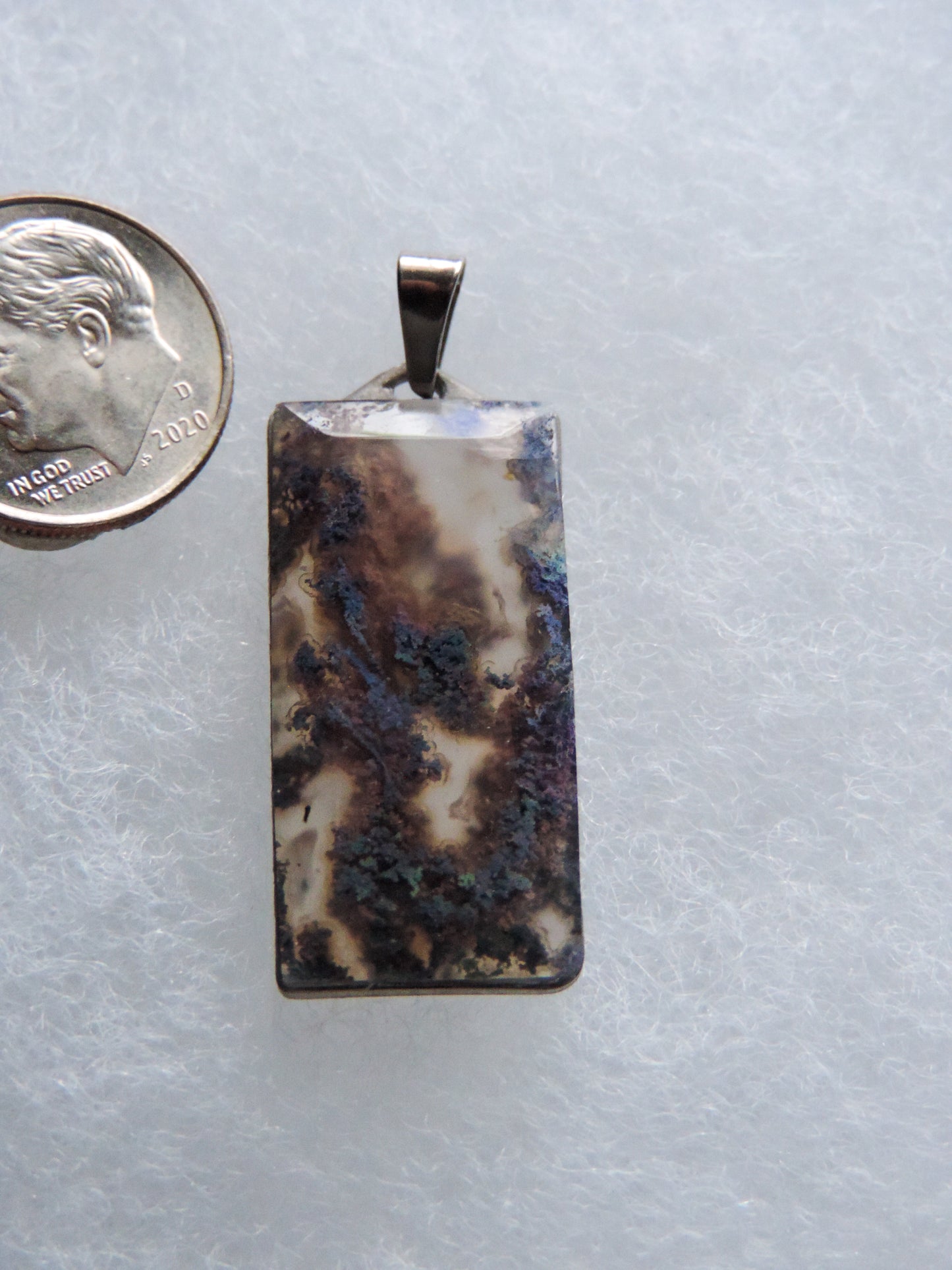 Find your perfect Indonesian Moss Agate on our store! Our hand crafted jewelry pendant is photographed next to an item for size comparison