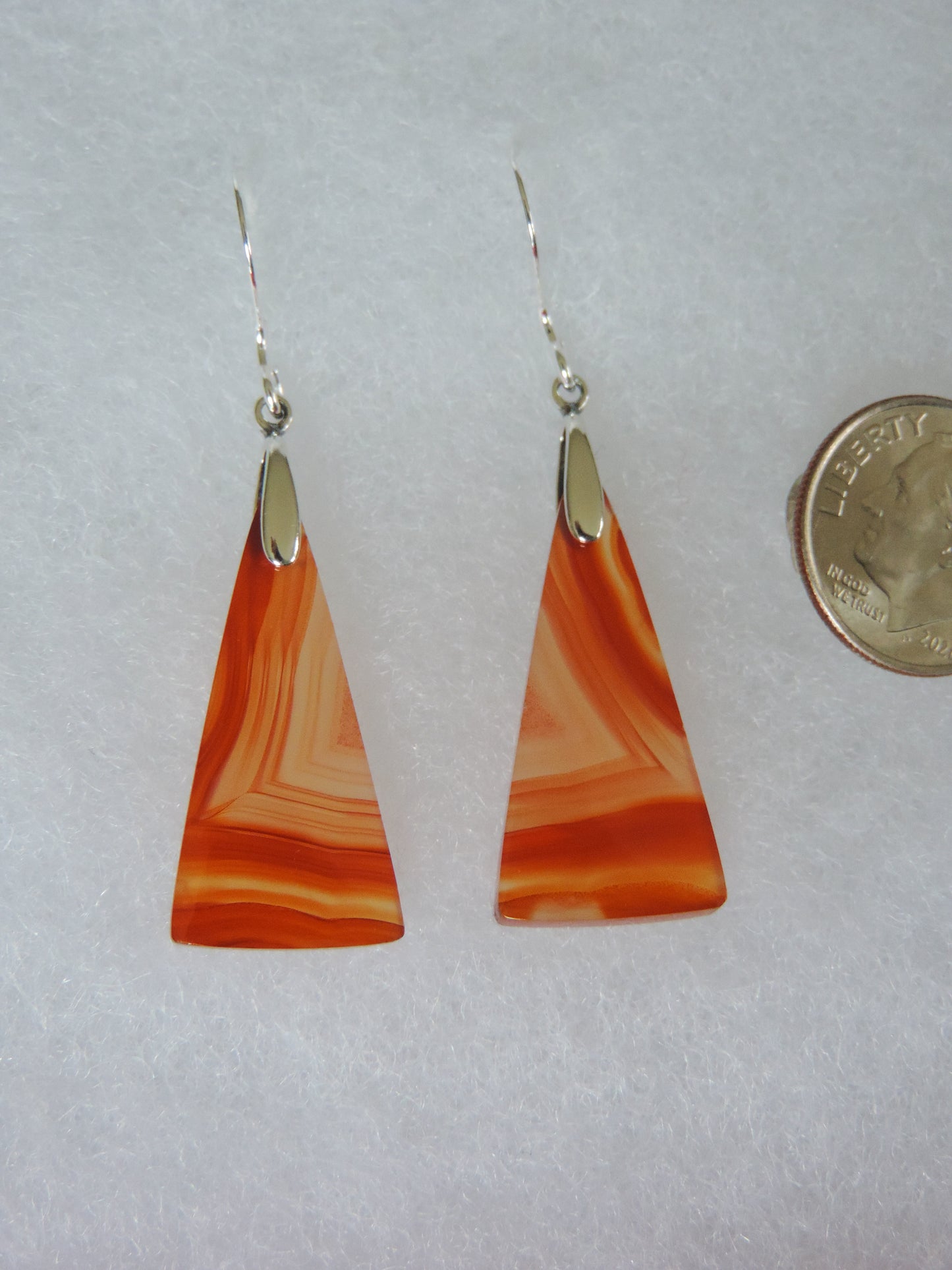 Carnelian Agate & Sterling Silver Earrings Indonesian Carnelian Agates exhibit a wide variety of colors and amazing complexity. No two agates are exactly alike, each one being a unique and beautiful creation!