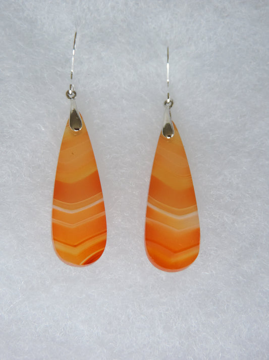 Carnelian Agate & Sterling Silver Earrings.  Indonesian Carnelian Agates exhibit a wide variety of colors and amazing complexity.  No two agates are exactly alike, each one being a unique and beautiful creation!  Agates with multiple bands of color are known as fortification agates, those with dendritic or moss looking inclusions are referred to as moss agate and many others are given descriptive names relative to their appearance or where they are found.