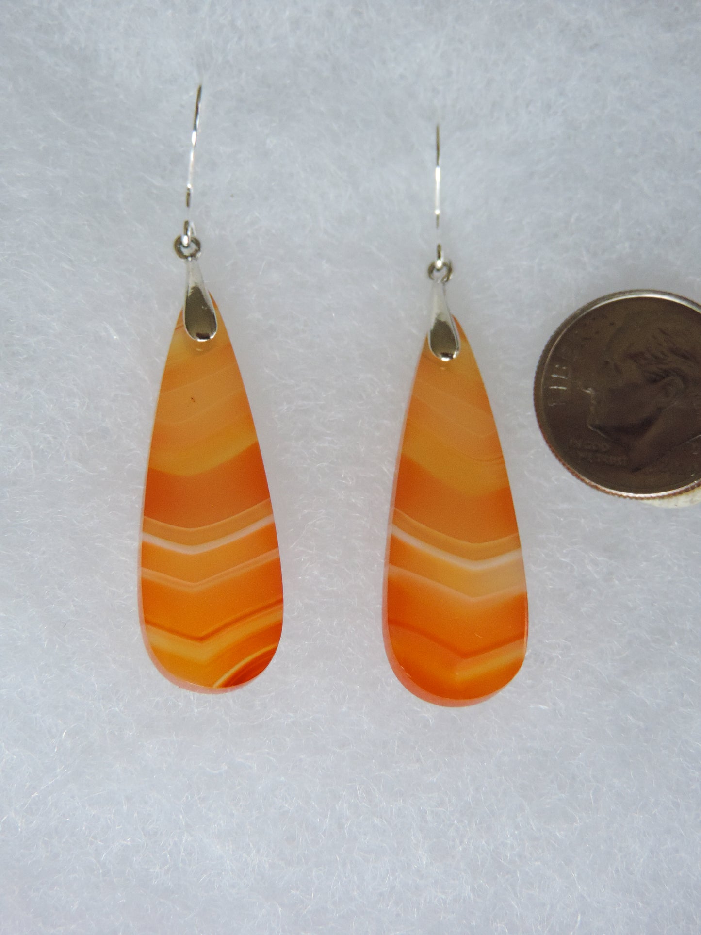 Find your perfect beautiful Indonesian Carnelian Agate Earrings on our store today!! The bail and earring wire are authentic 925 sterling silver.