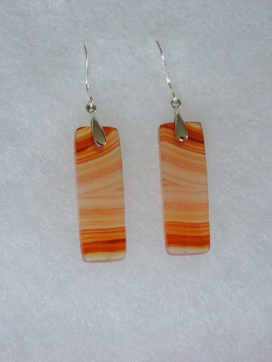 Carnelian Agate & Sterling Silver Earrings.  Indonesian Agates exhibit a wide variety of colors and amazing complexity.  No two agates are exactly alike, each one being a unique and beautiful creation!  Agates with multiple bands of color are known as fortification agates, those with dendritic or moss looking inclusions are referred to as moss agate and many others are given descriptive names relative to their appearance or where they are found.
