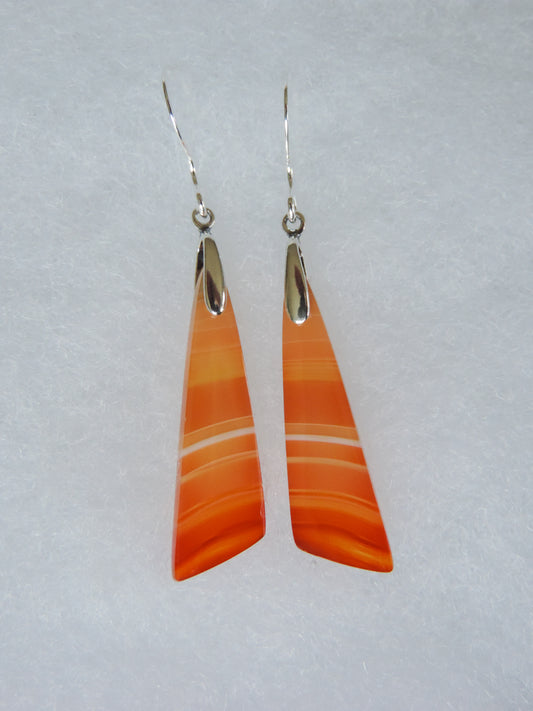 Carnelian Agate & Sterling Silver Earrings  Indonesian Agates exhibit a wide variety of colors and amazing complexity.  No two agates are exactly alike, each one being a unique and beautiful creation!  Agates with multiple bands of color are known as fortification agates, those with dendritic or moss looking inclusions are referred to as moss agate and many others are given descriptive names relative to their appearance or where they are found.