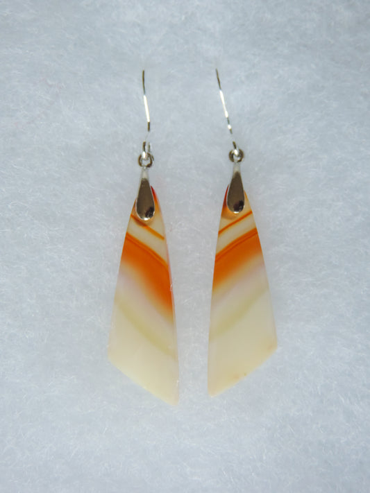 Carnelian Agate & Sterling Silver Earrings.  Indonesian Agates exhibit a wide variety of colors and amazing complexity.  No two agates are exactly alike, each one being a unique and beautiful creation!  Agates with multiple bands of color are known as fortification agates, those with dendritic or moss looking inclusions are referred to as moss agate and many others are given descriptive names relative to their appearance or where they are found.
