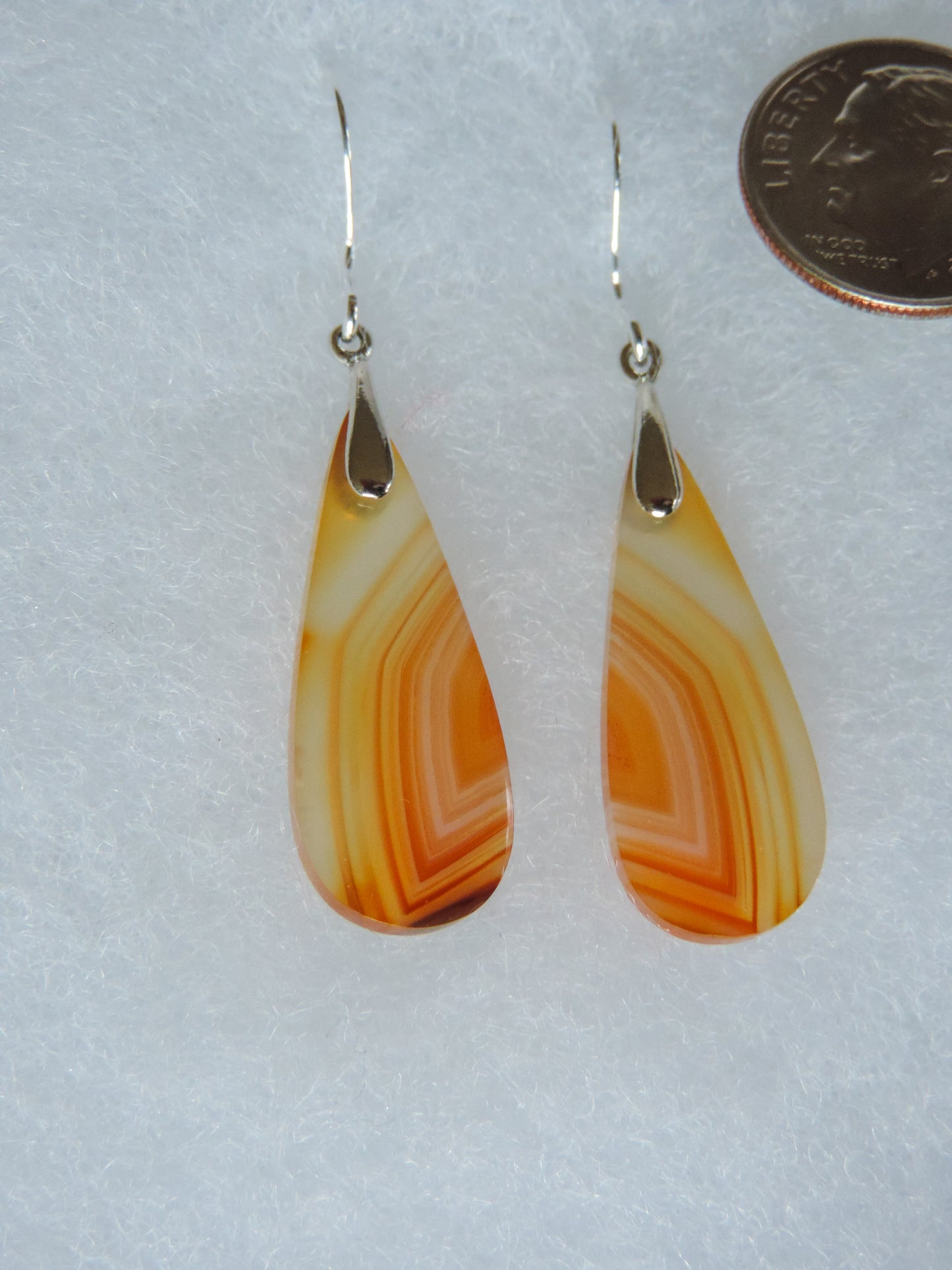 This stone is a natural color, no dyes or heat treatment have been used. It was photographed without filters on automatic setting in natural light; however, slight color variations may occur due to digitization. Natural stones can have nooks and crannies, inclusions or small cracks, these distinguishing features lend character to the piece.