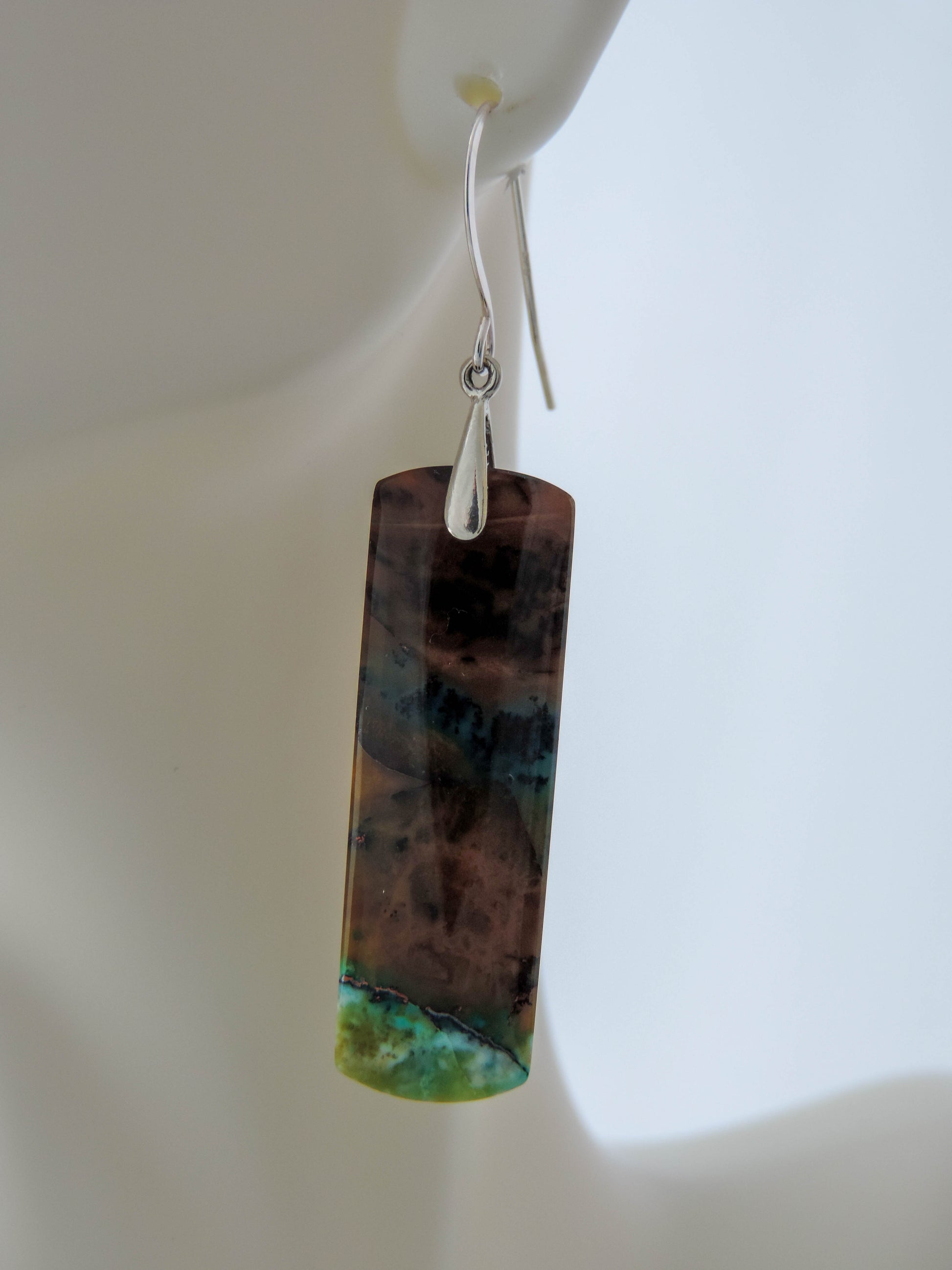 Indonesian Blue Opalized Wood Earrings with Sterling Silver, wonderful jewelry.  Extremely rare and lovely, Indonesian Blue Opalized Wood is a cherished material used by lapidary artists for creating stunning pieces of jewelry.  The material was first found as pebbles and rounded stones in streams and near the slopes of three volcanoes in the West Java Province.