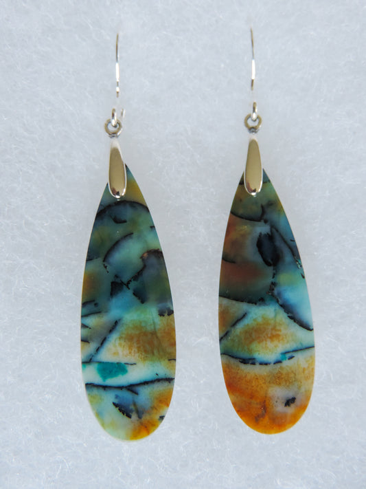 Indonesian Blue Opalized Wood & Sterling Silver Earrings.  Feel treasured when you wear these earrings!  Extremely rare and lovely, Indonesian Blue Opalized Wood is a cherished material used by lapidary artists for creating stunning pieces of jewelry.  The material was first found as pebbles and rounded stones in streams and near the slopes of three volcanoes in the West Java Province.